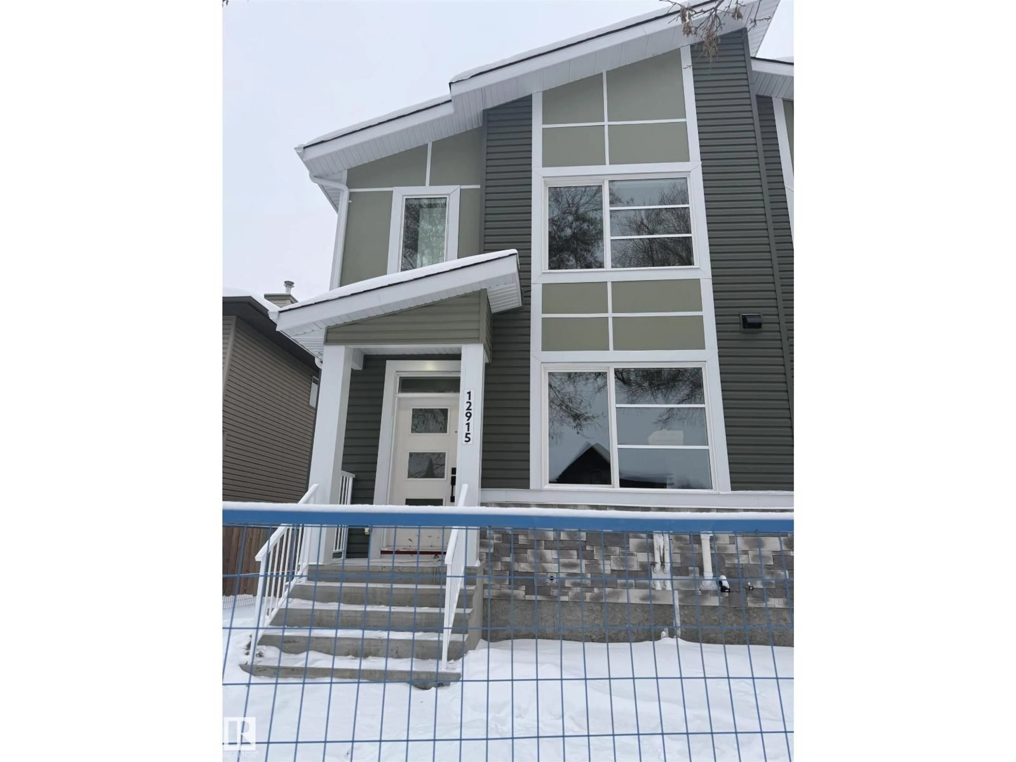 Home with vinyl exterior material, building for 12915 123 ST, Edmonton Alberta T5L0J6
