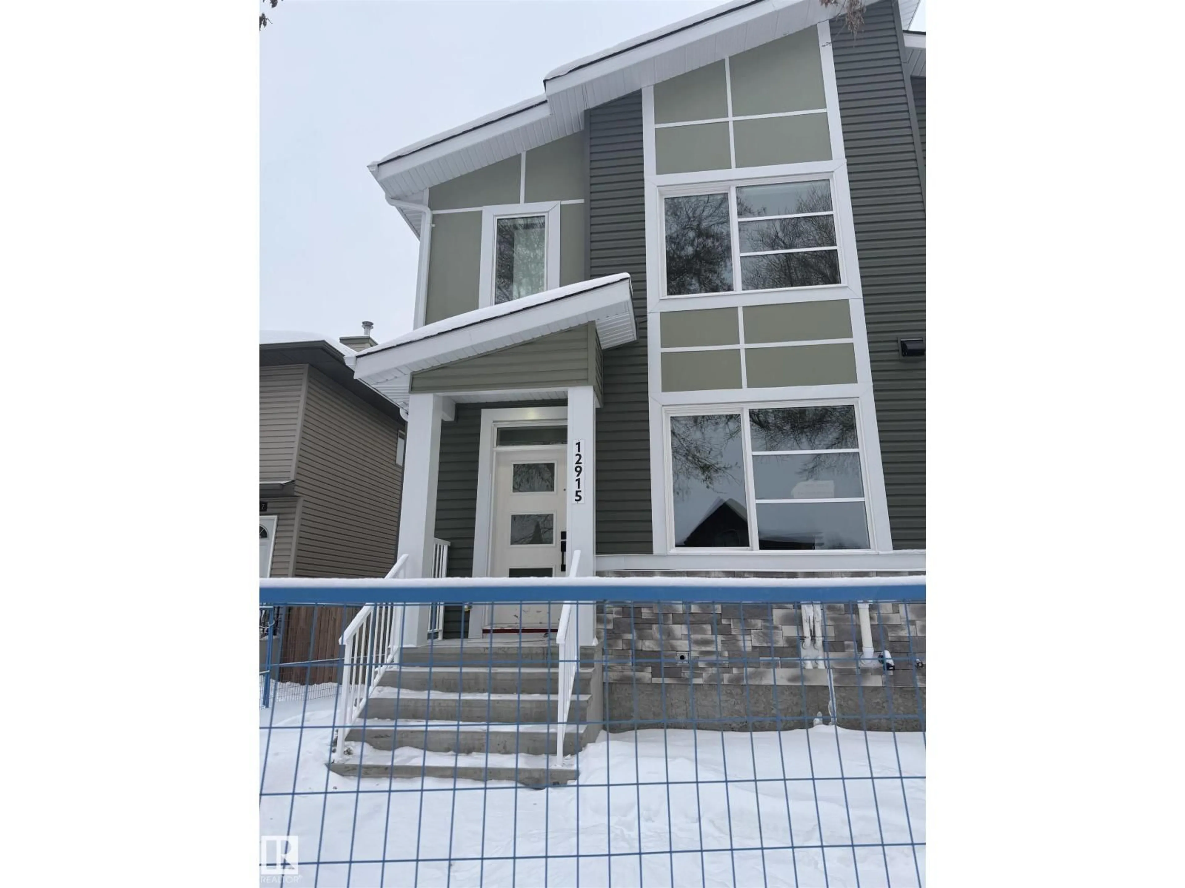 Home with vinyl exterior material, building for 12915 123 ST, Edmonton Alberta T5L0J6