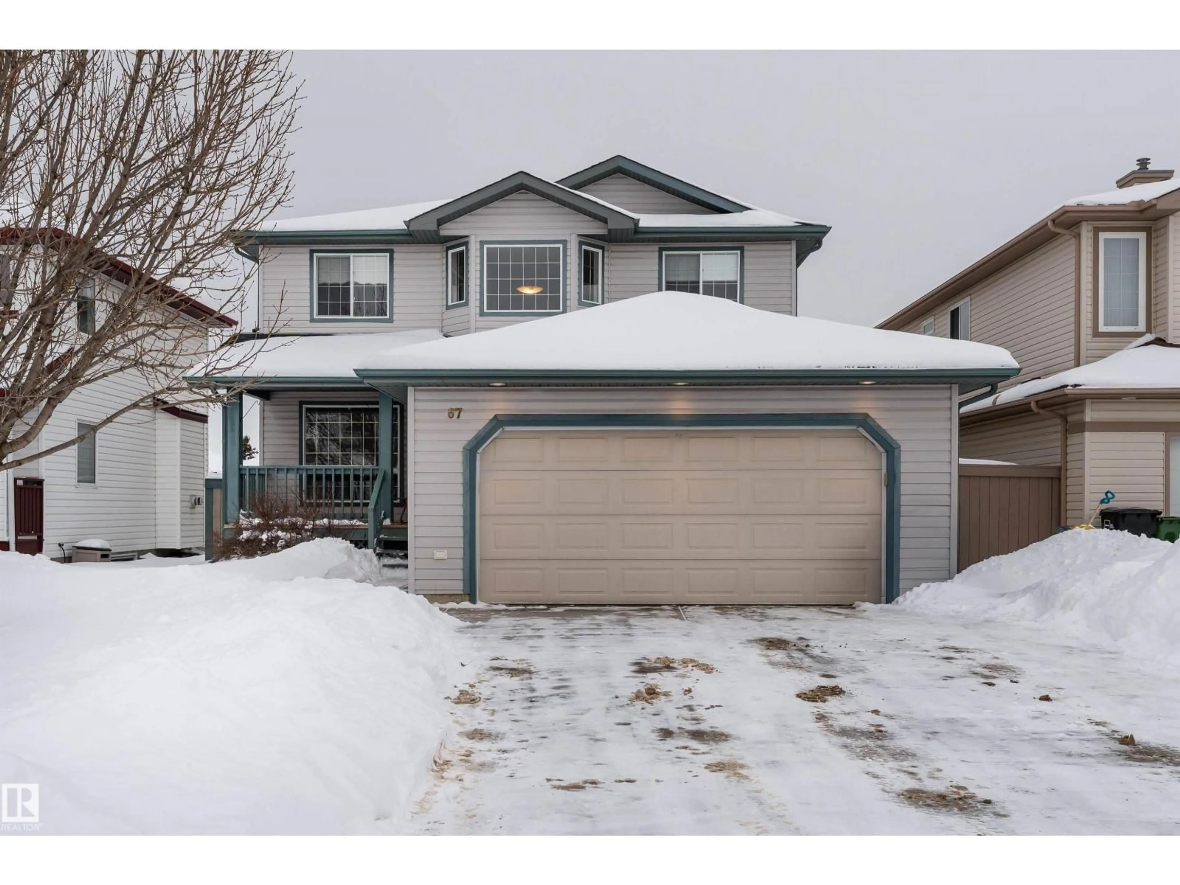 Home with vinyl exterior material, street for 67 DECHENE ROAD, Edmonton Alberta T6M2M9