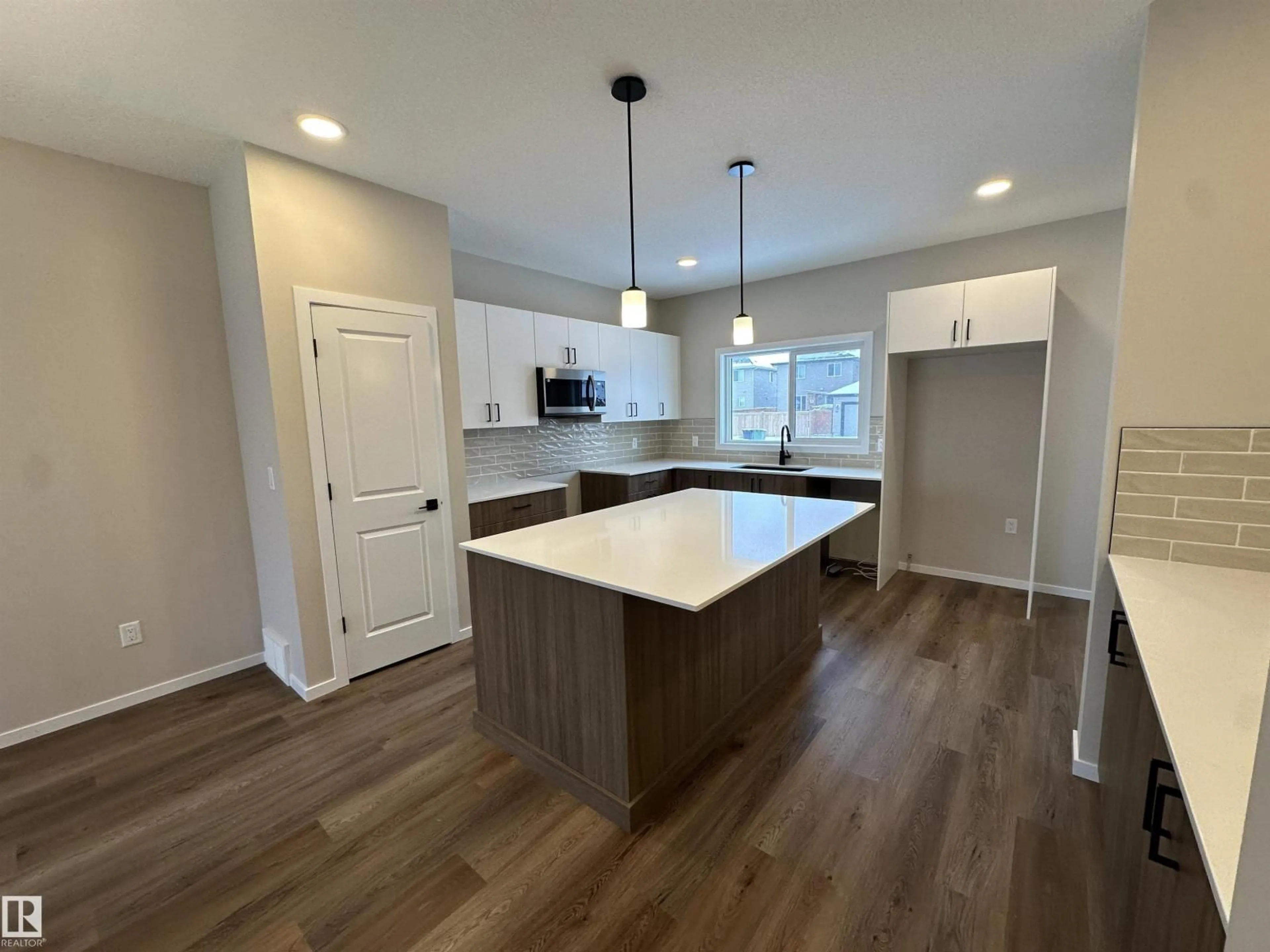 Open concept kitchen, unknown for 55 SERENO LN, Fort Saskatchewan Alberta T8L0Z9