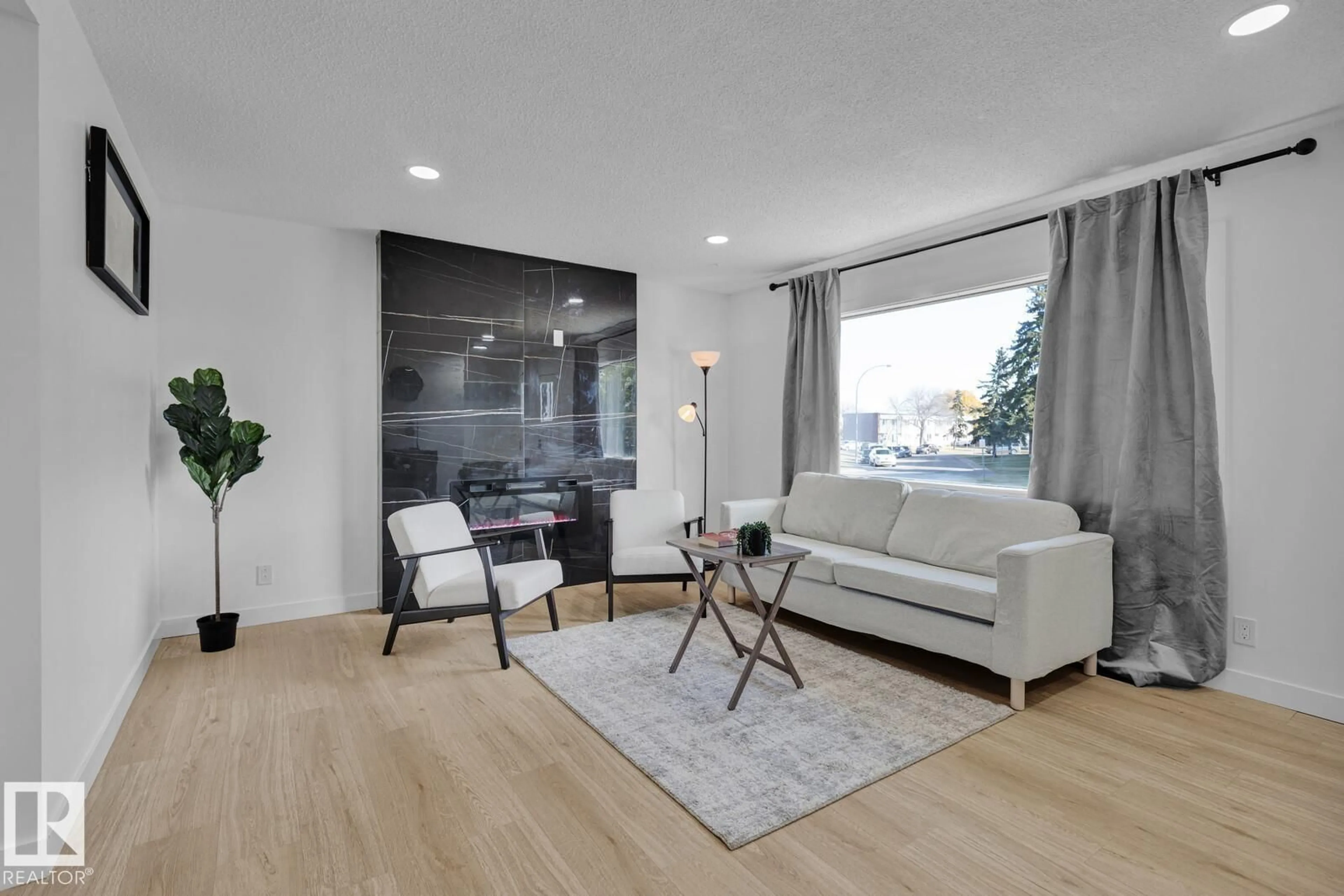 Living room with furniture, unknown for 5803 136 AV, Edmonton Alberta T5A0N4