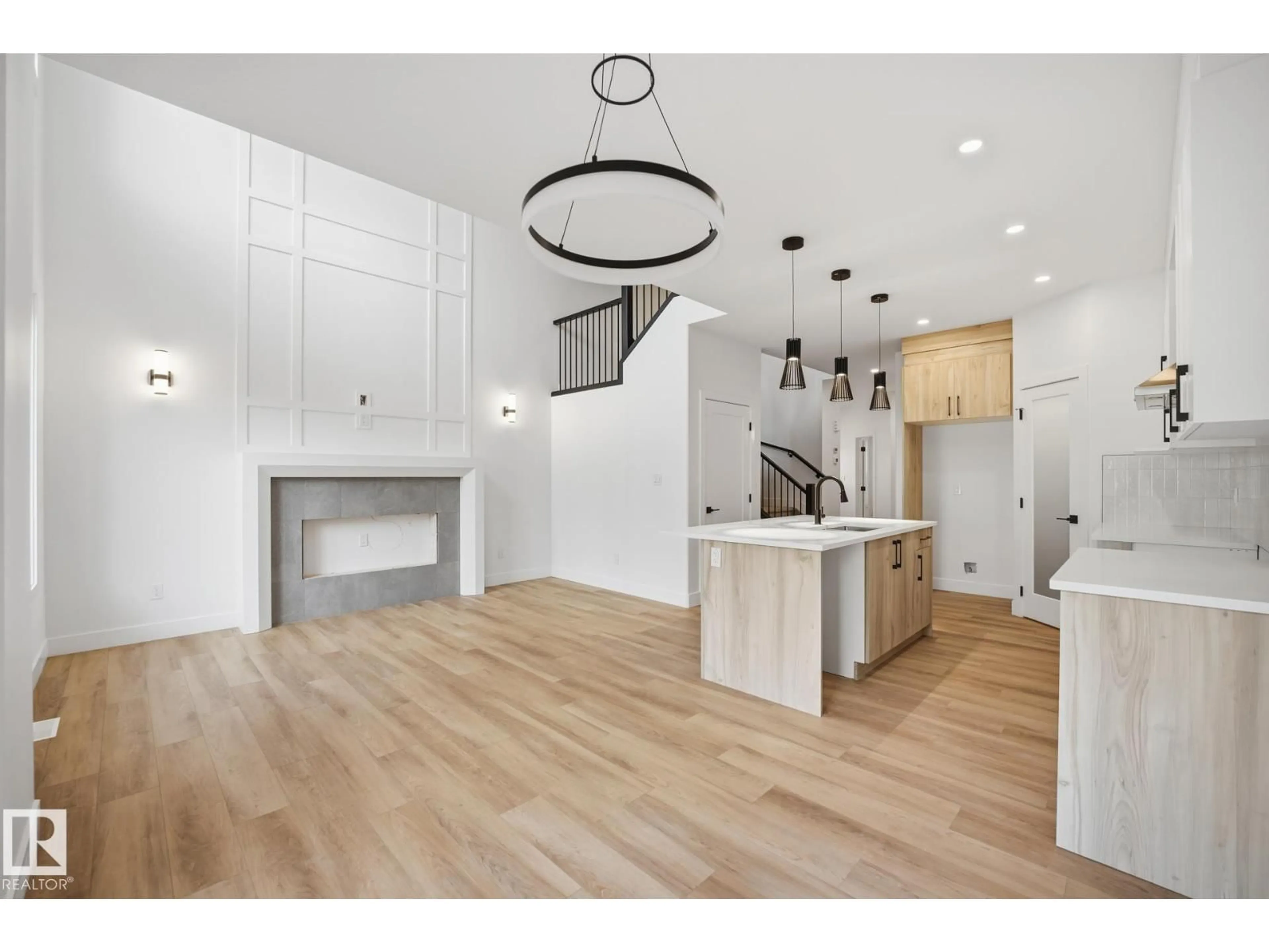 Open concept kitchen, wood/laminate floor for 113 HILTON COVE, Spruce Grove Alberta T7X1Y4