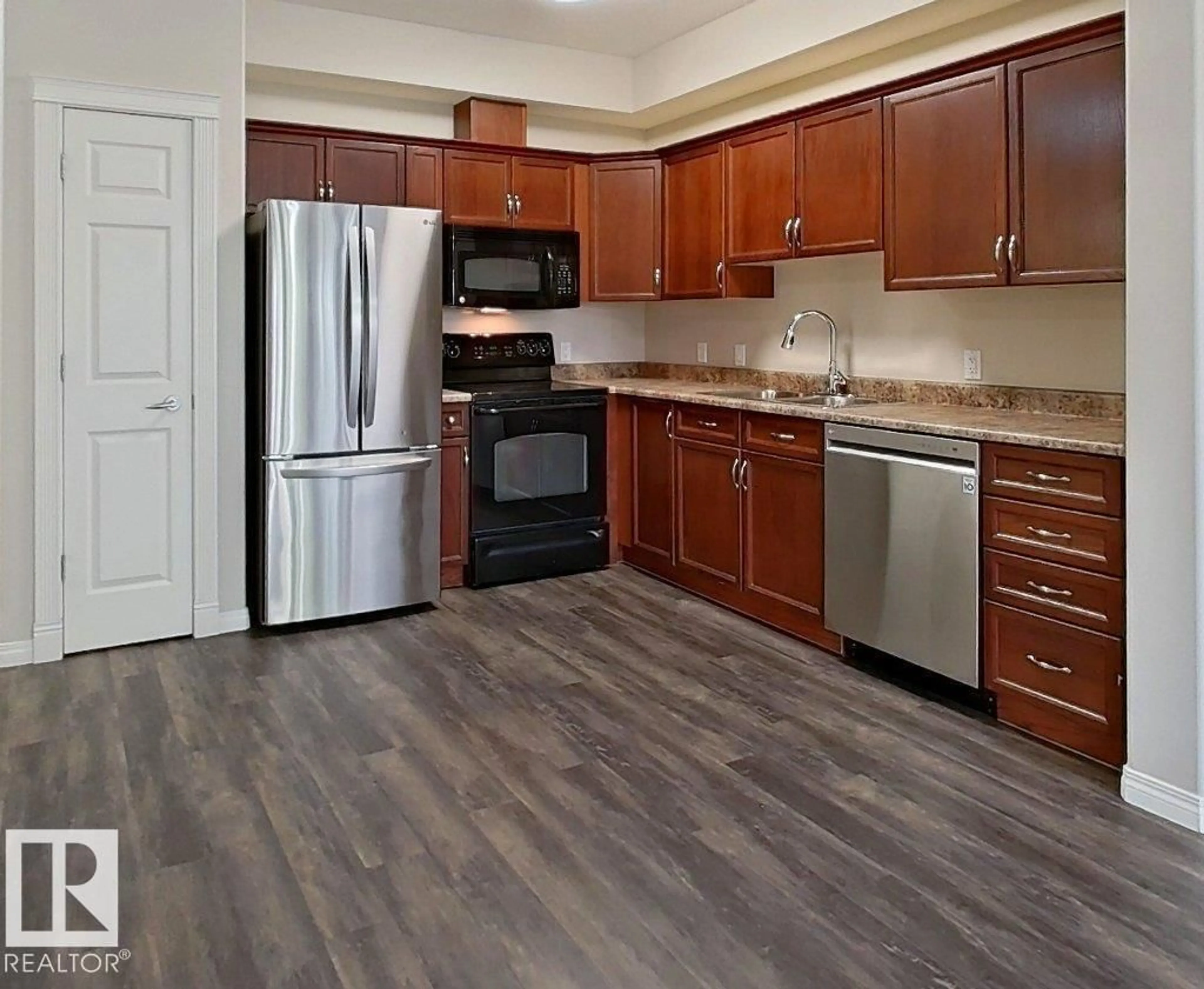 Standard kitchen, wood/laminate floor for #203 - 8702 SOUTHFORT DR, Fort Saskatchewan Alberta T8L4R6