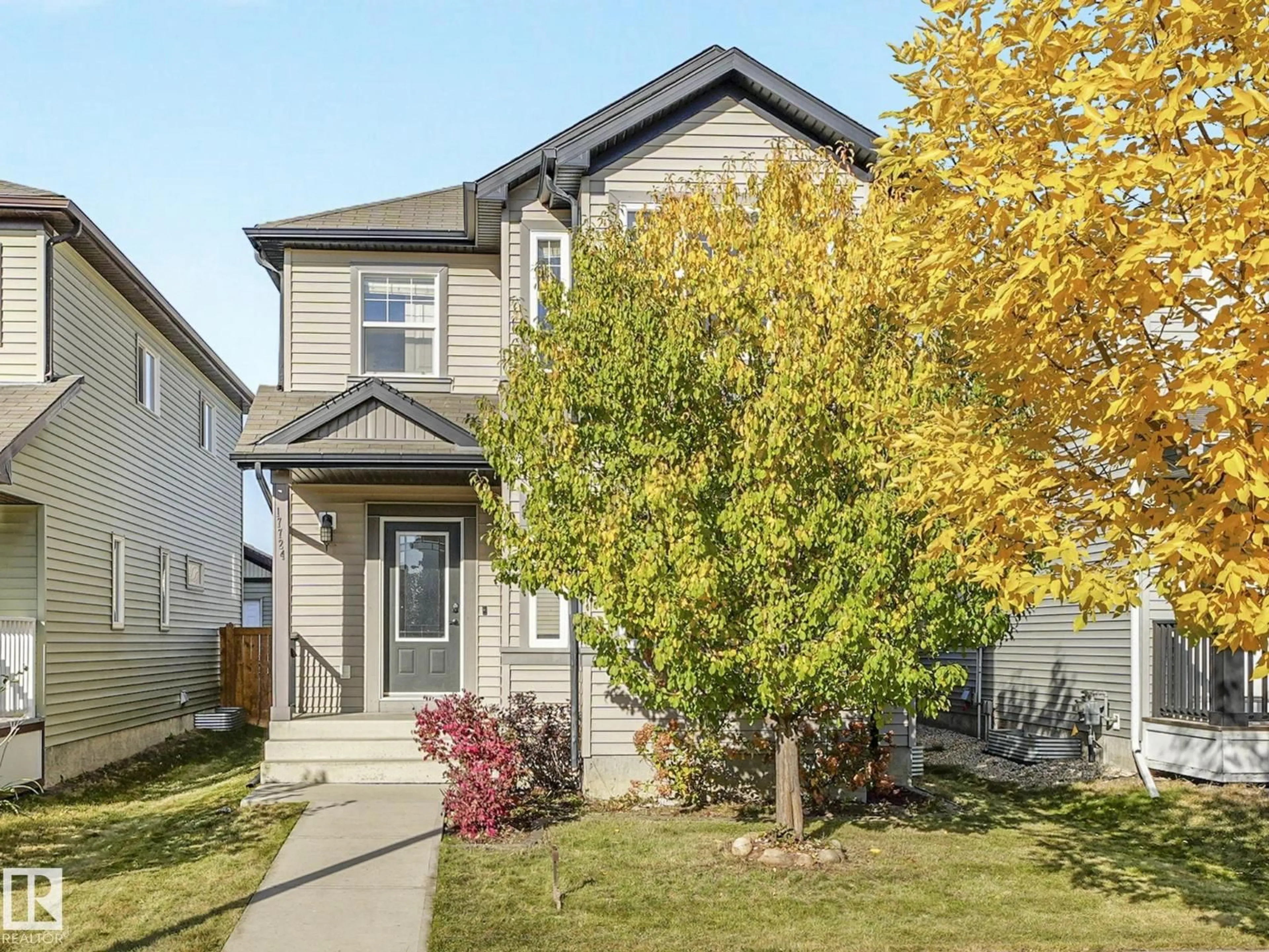 Home with vinyl exterior material, street for 17724 6 AV, Edmonton Alberta T6W2G6