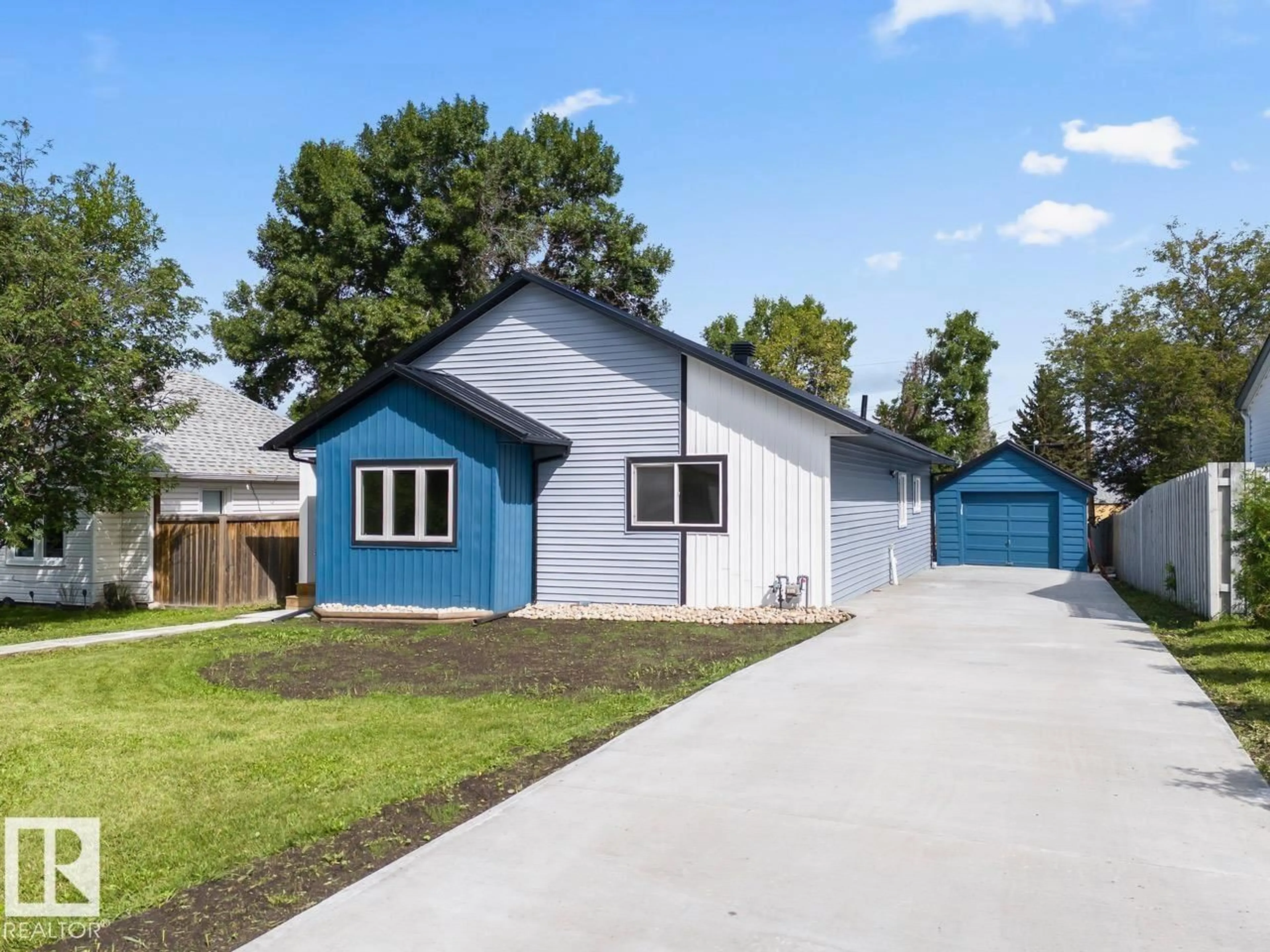 Home with vinyl exterior material, street for 5032 55 AV, Tofield Alberta T0B4J0