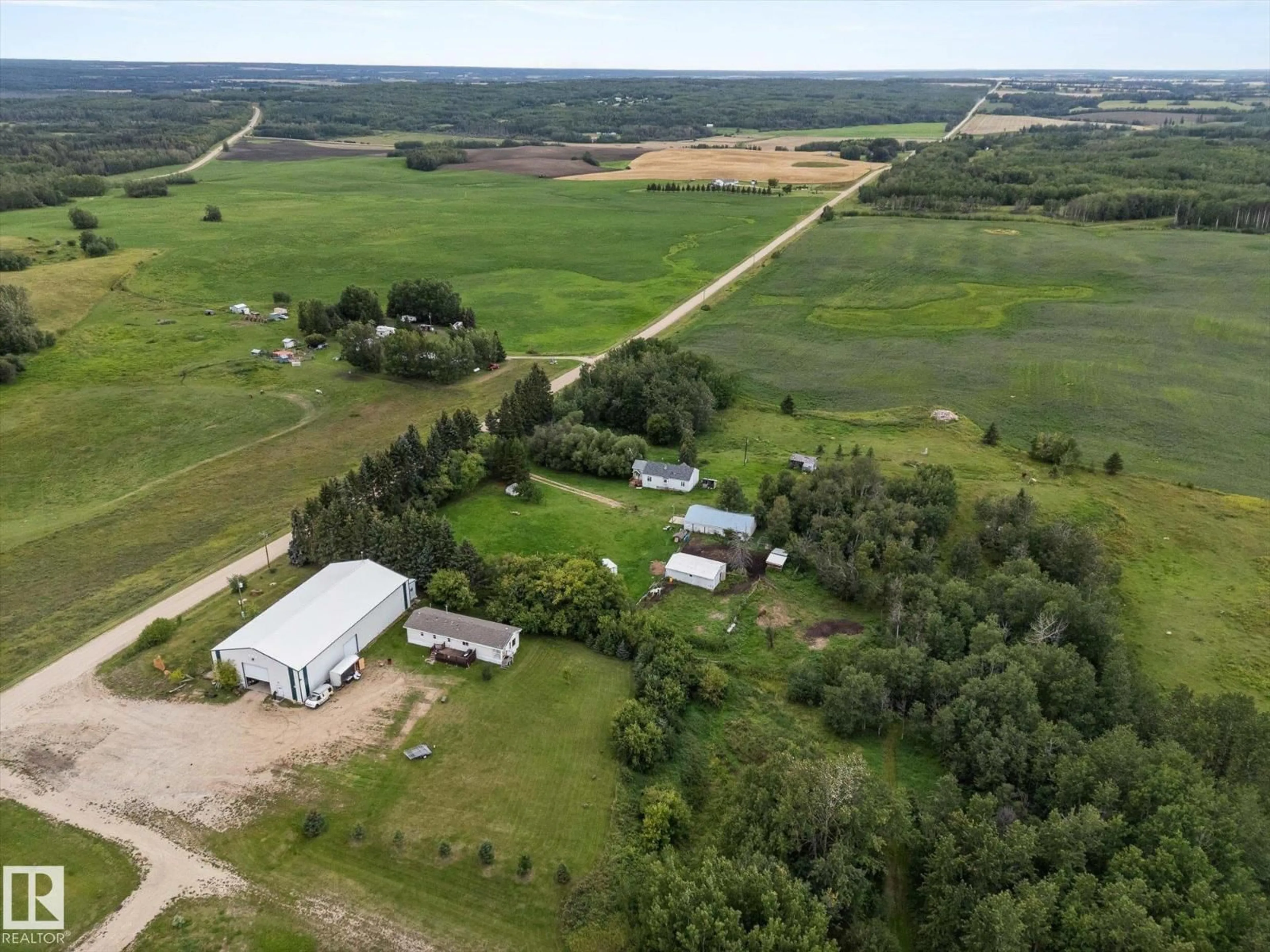 A pic from outside/outdoor area/front of a property/back of a property/a pic from drone, unknown for 1308 TWP ROAD 552, Rural Lac Ste. Anne County Alberta T0E1V0