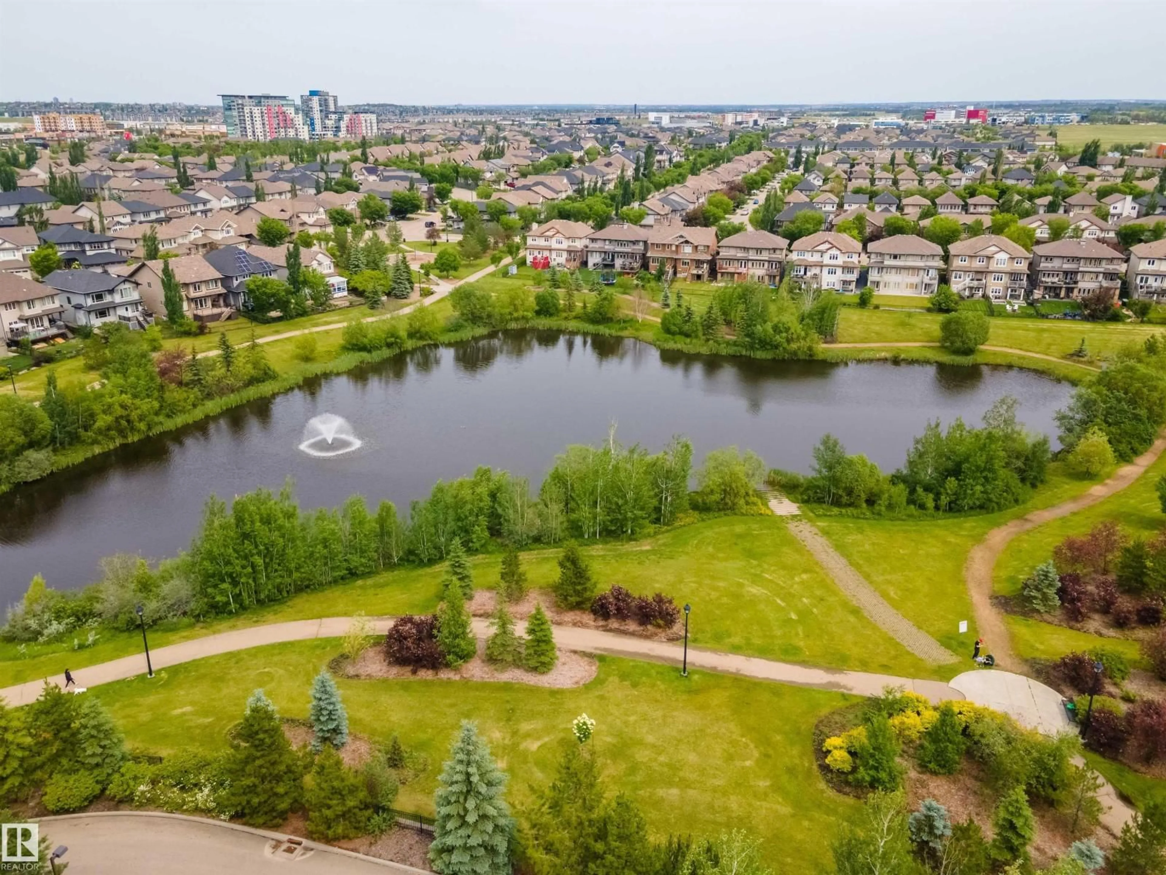 A pic from outside/outdoor area/front of a property/back of a property/a pic from drone, water/lake/river/ocean view for #105 - 2584 ANDERSON WY, Edmonton Alberta T6W0R2