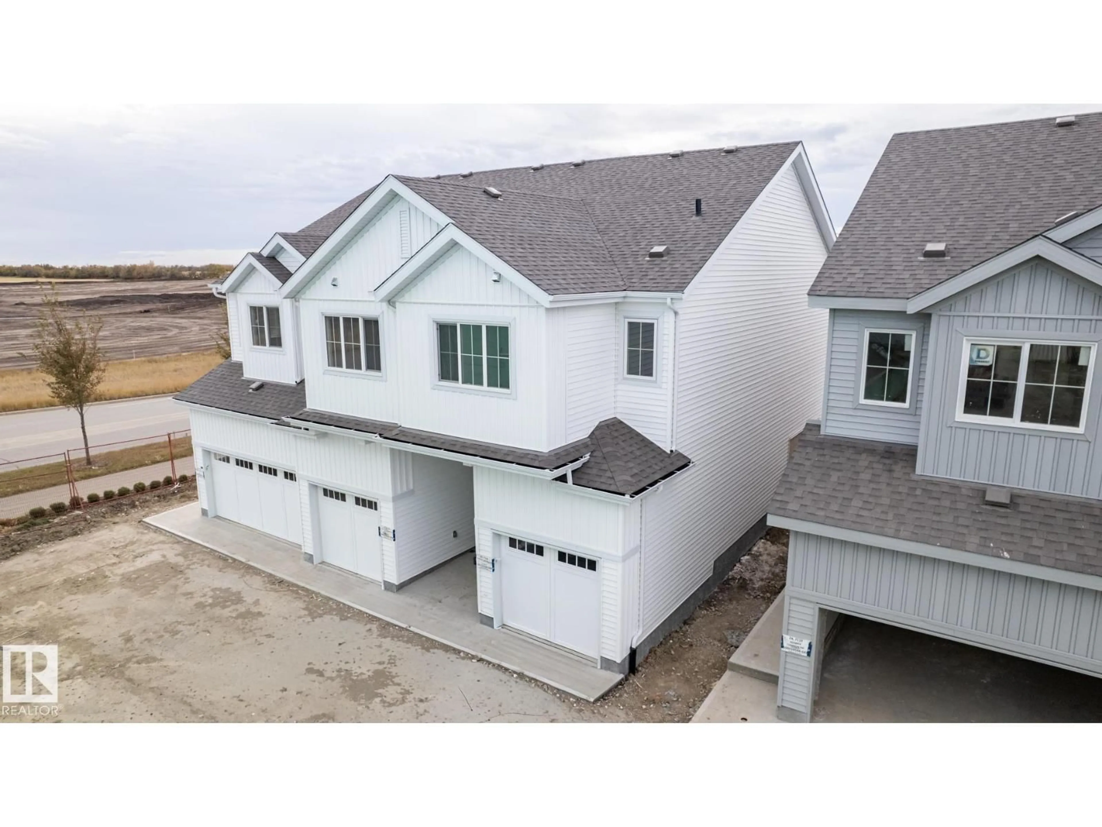 A pic from outside/outdoor area/front of a property/back of a property/a pic from drone, street for #25 - 7110 KESWICK CM, Edmonton Alberta T6W5P7