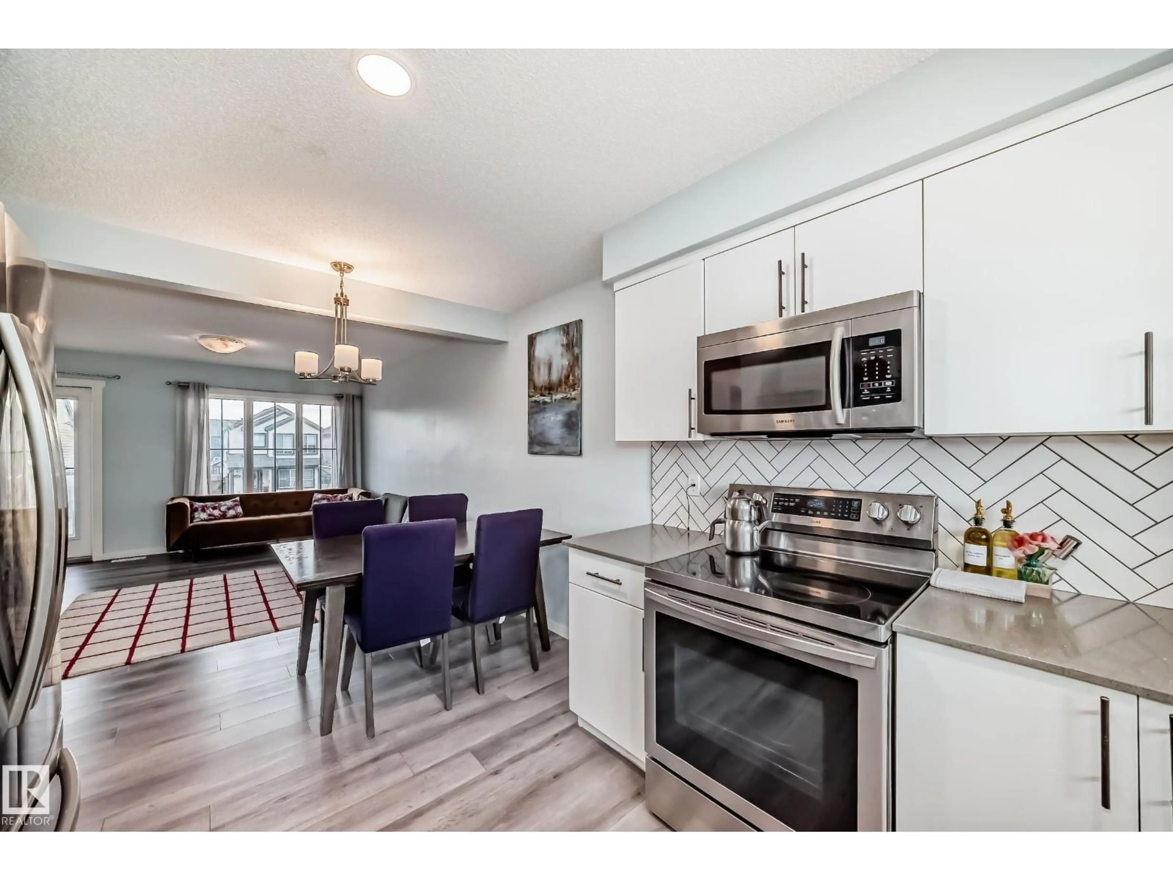 Open concept kitchen, unknown for NW - 19312 27 AV, Edmonton Alberta T6M1K9