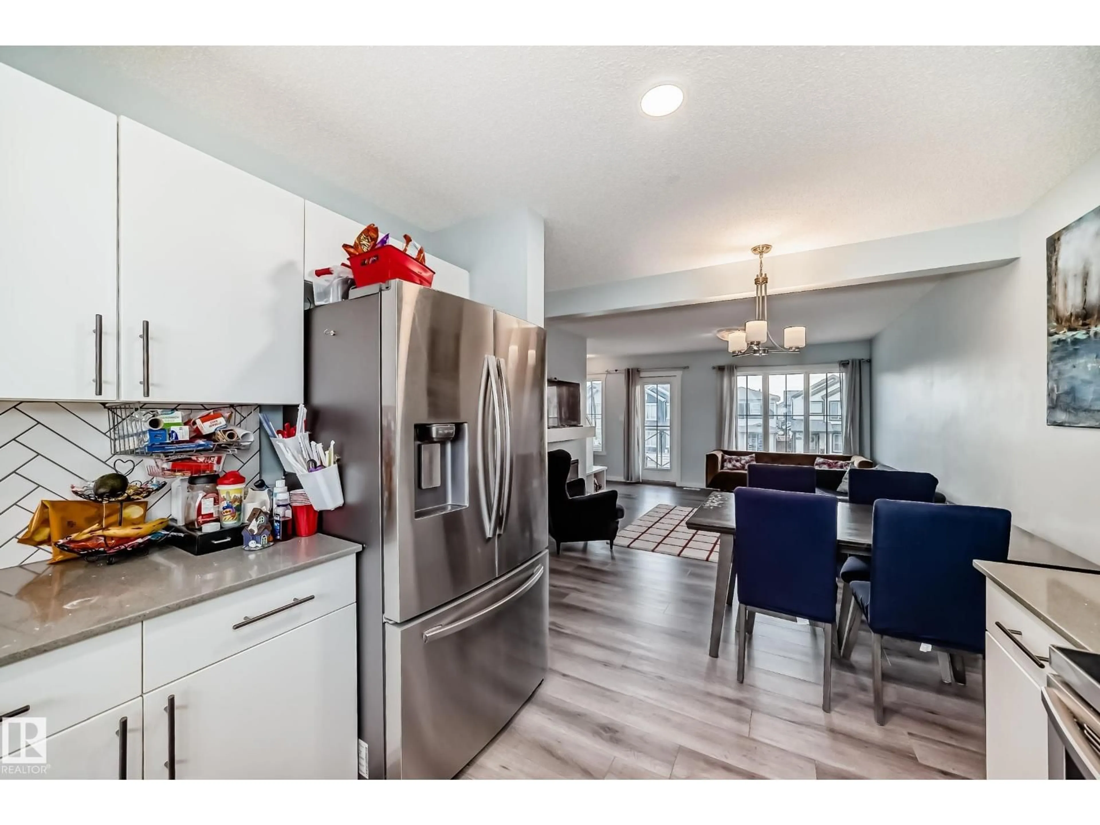 Open concept kitchen, unknown for NW - 19312 27 AV, Edmonton Alberta T6M1K9