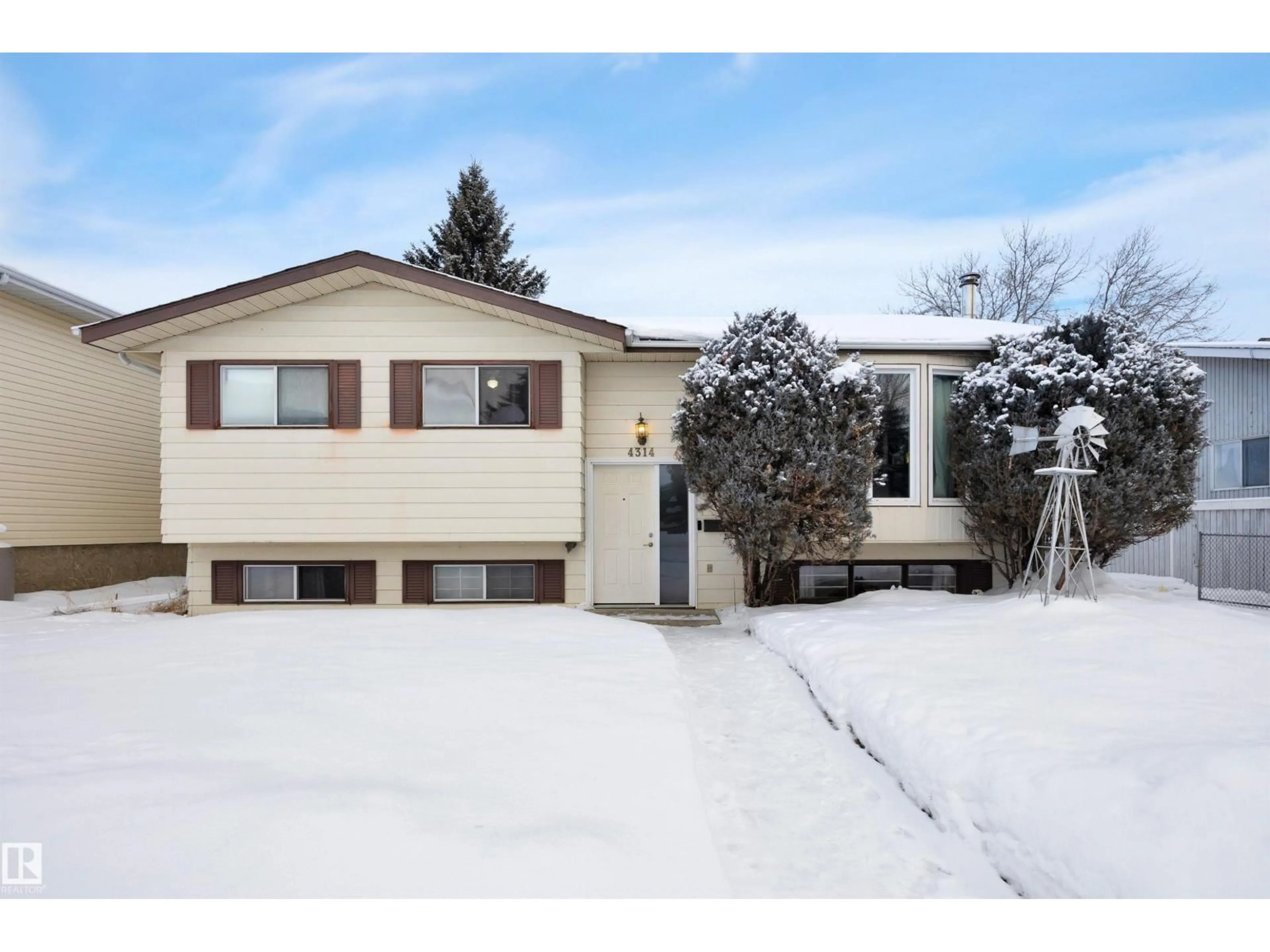 Home with vinyl exterior material, street for 4314 39 AV, Leduc Alberta T9E4X6