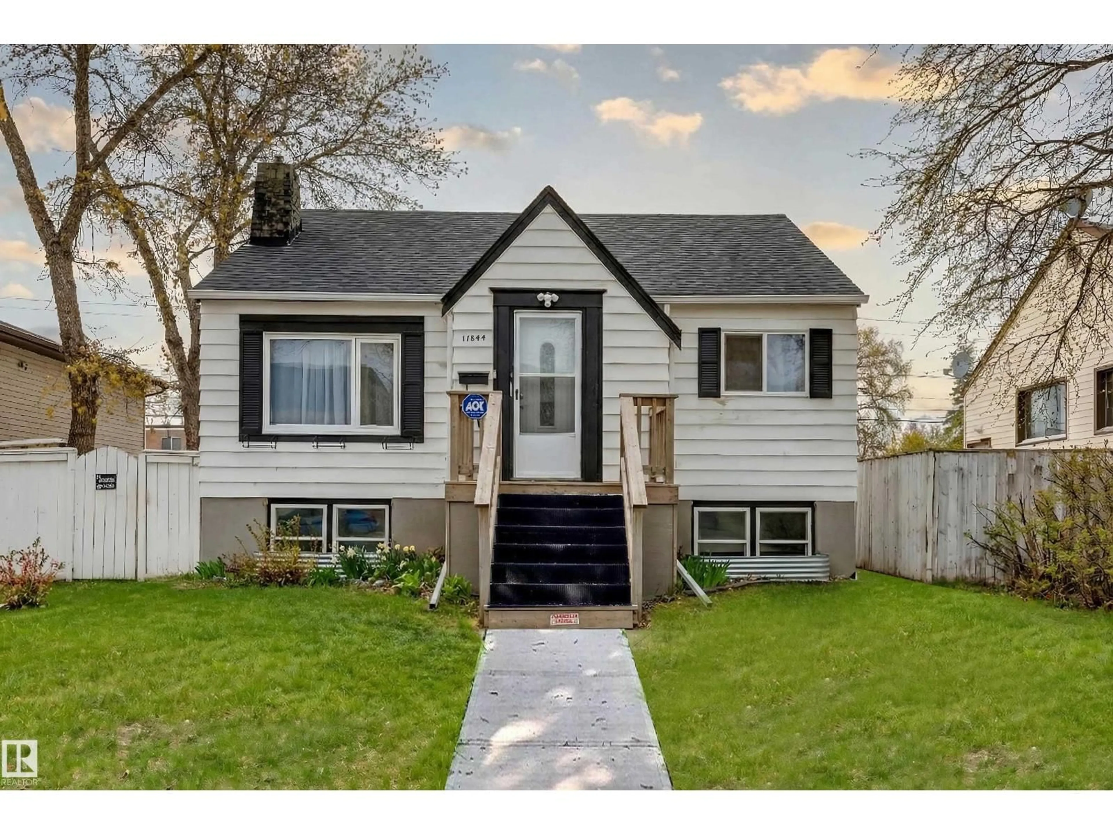 Home with vinyl exterior material, street for 11844 96 ST, Edmonton Alberta T5G1V3