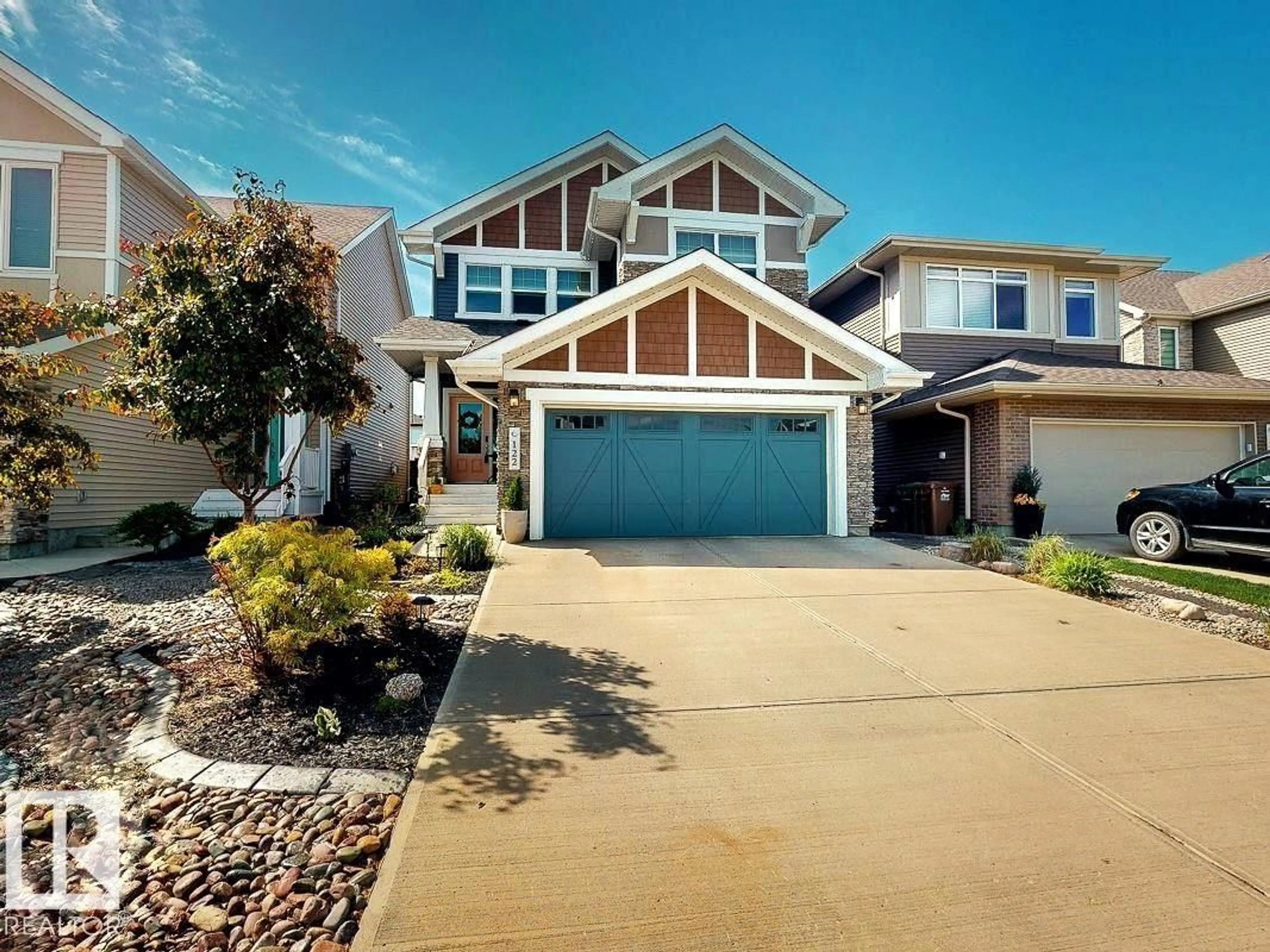 Home with vinyl exterior material, street for 122 JOYAL WY, St. Albert Alberta T8N7V3
