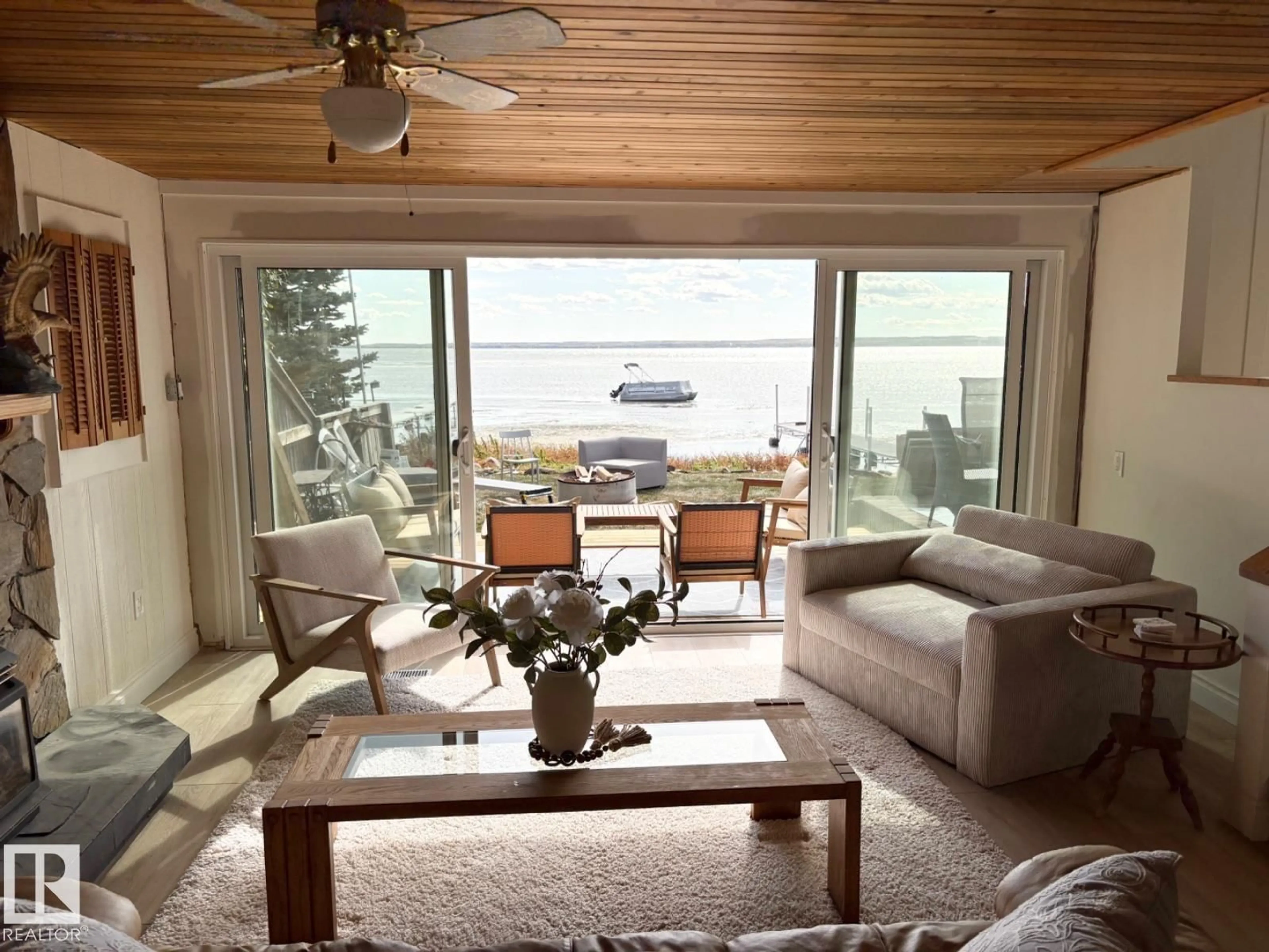 Living room with furniture, wood/laminate floor for A15 WICKS ST, Rural Leduc County Alberta T0C2P0