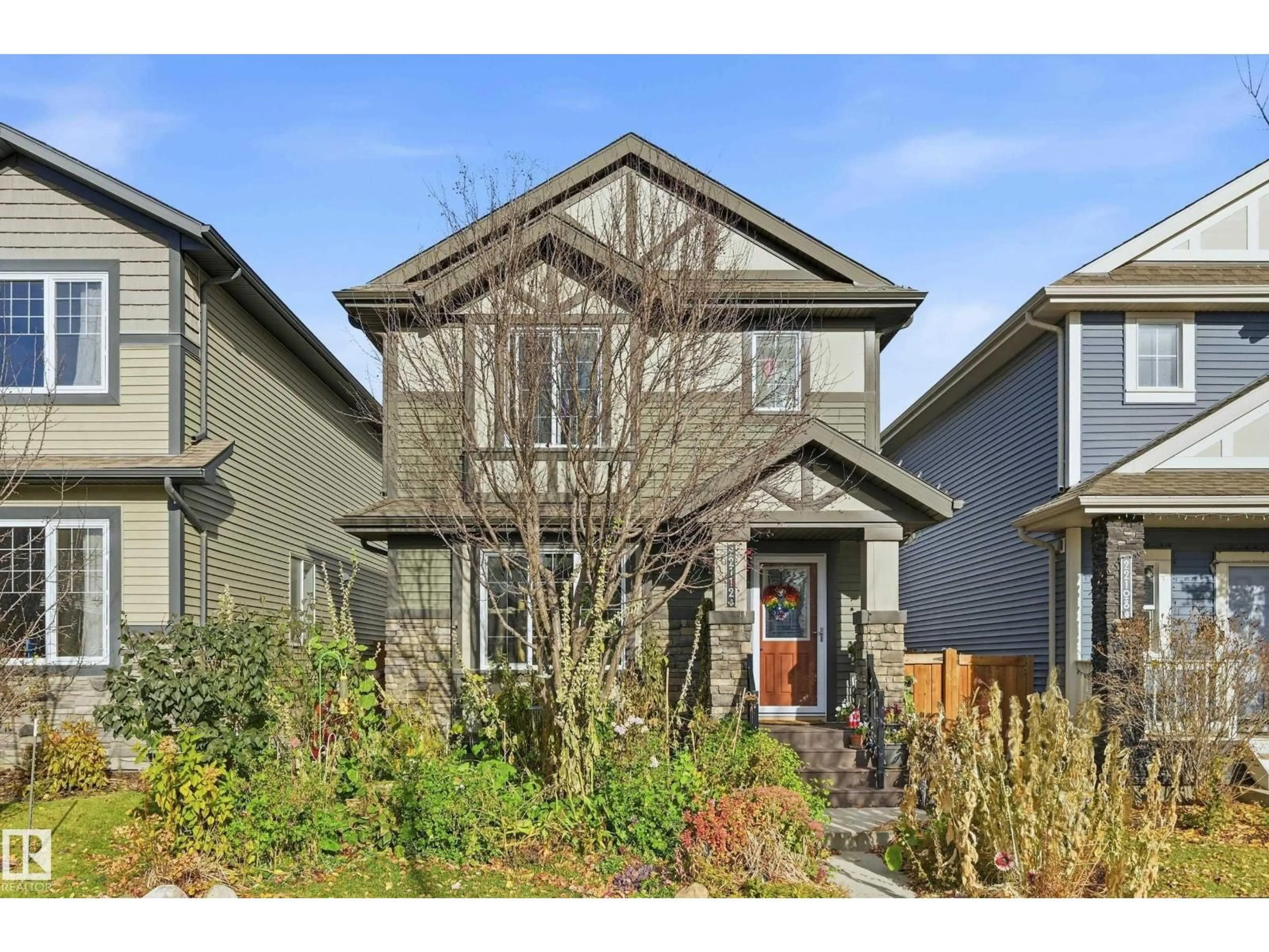 Home with vinyl exterior material, street for NW - 22112 88 AV, Edmonton Alberta T5T7G9