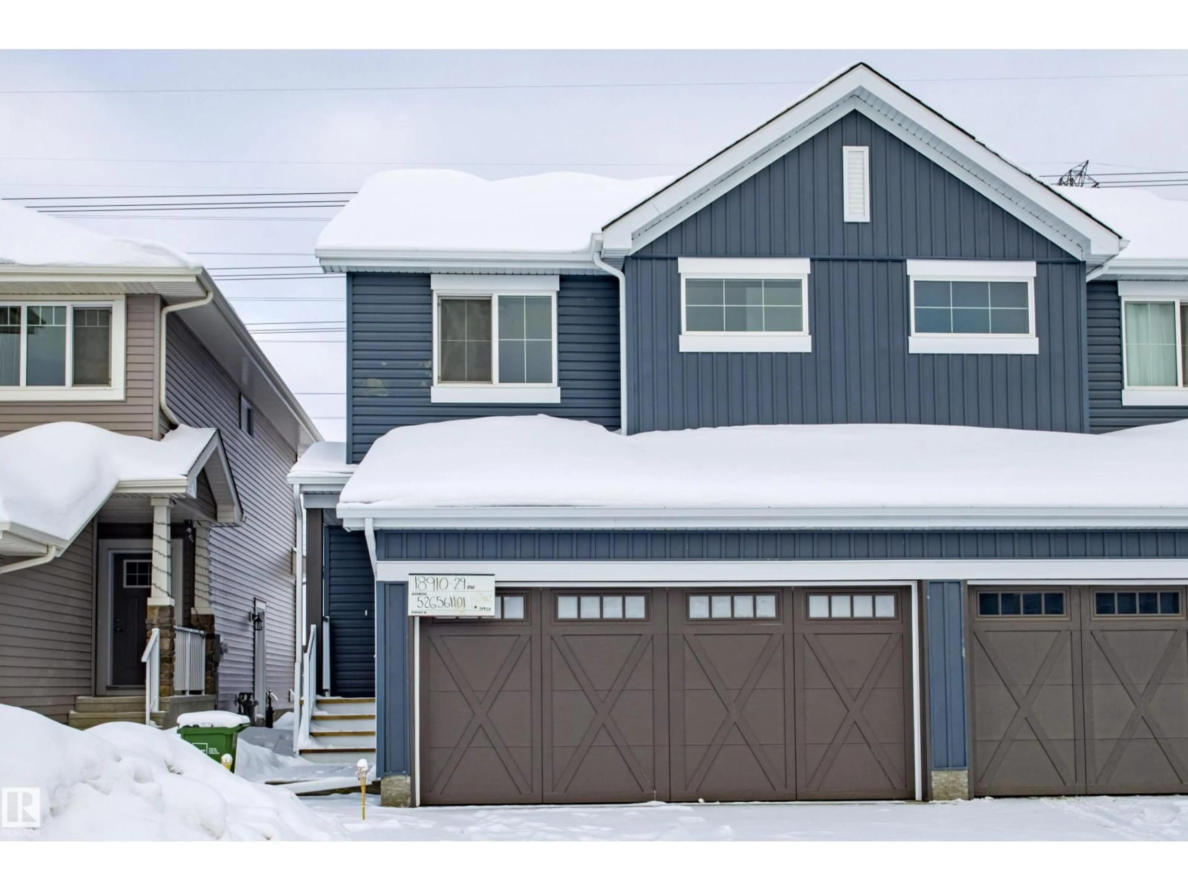Home with vinyl exterior material, street for 18910 29 AV, Edmonton Alberta T6M3C4