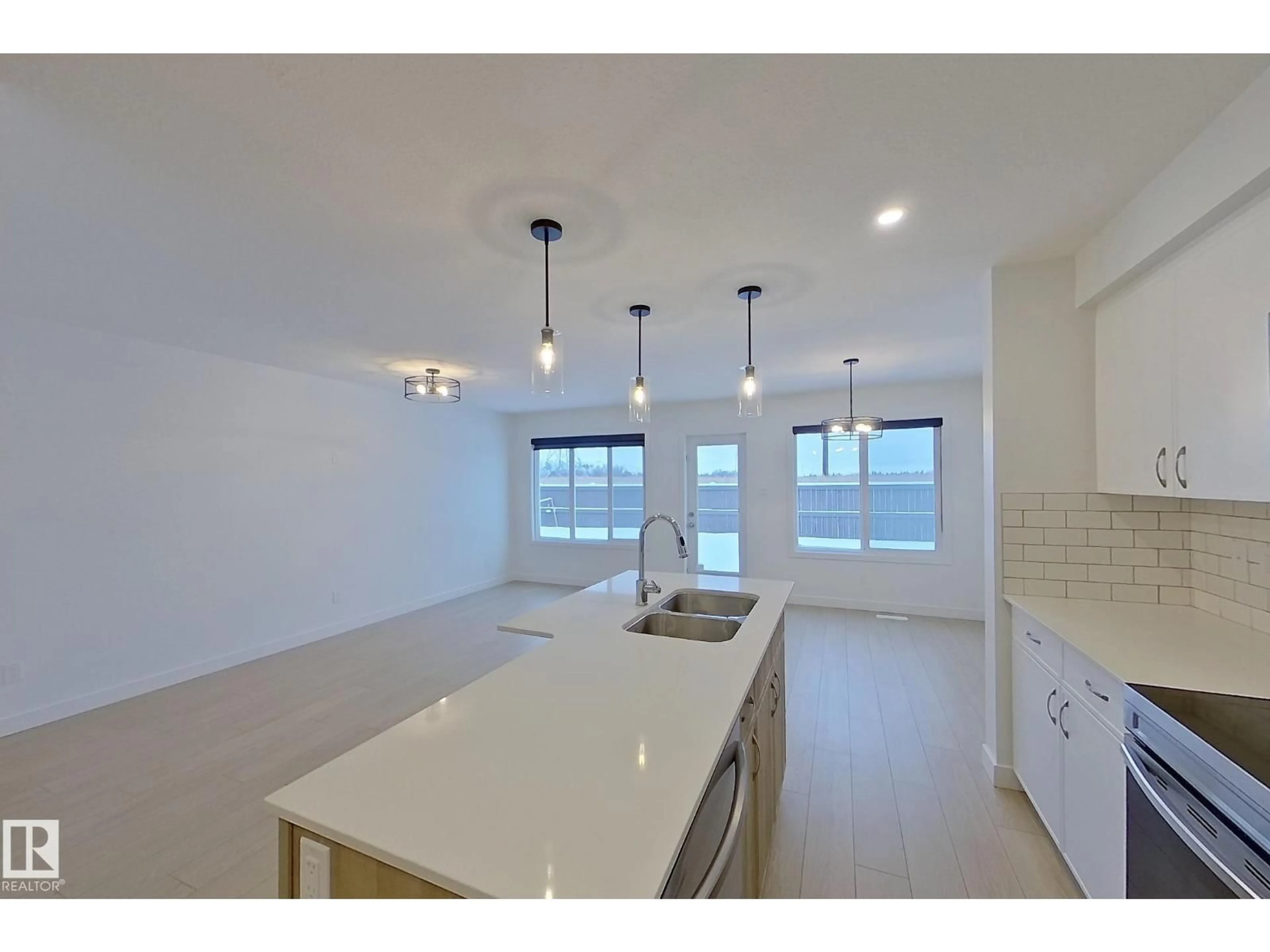 Open concept kitchen, ceramic/tile floor for 18910 29 AV, Edmonton Alberta T6M3C4