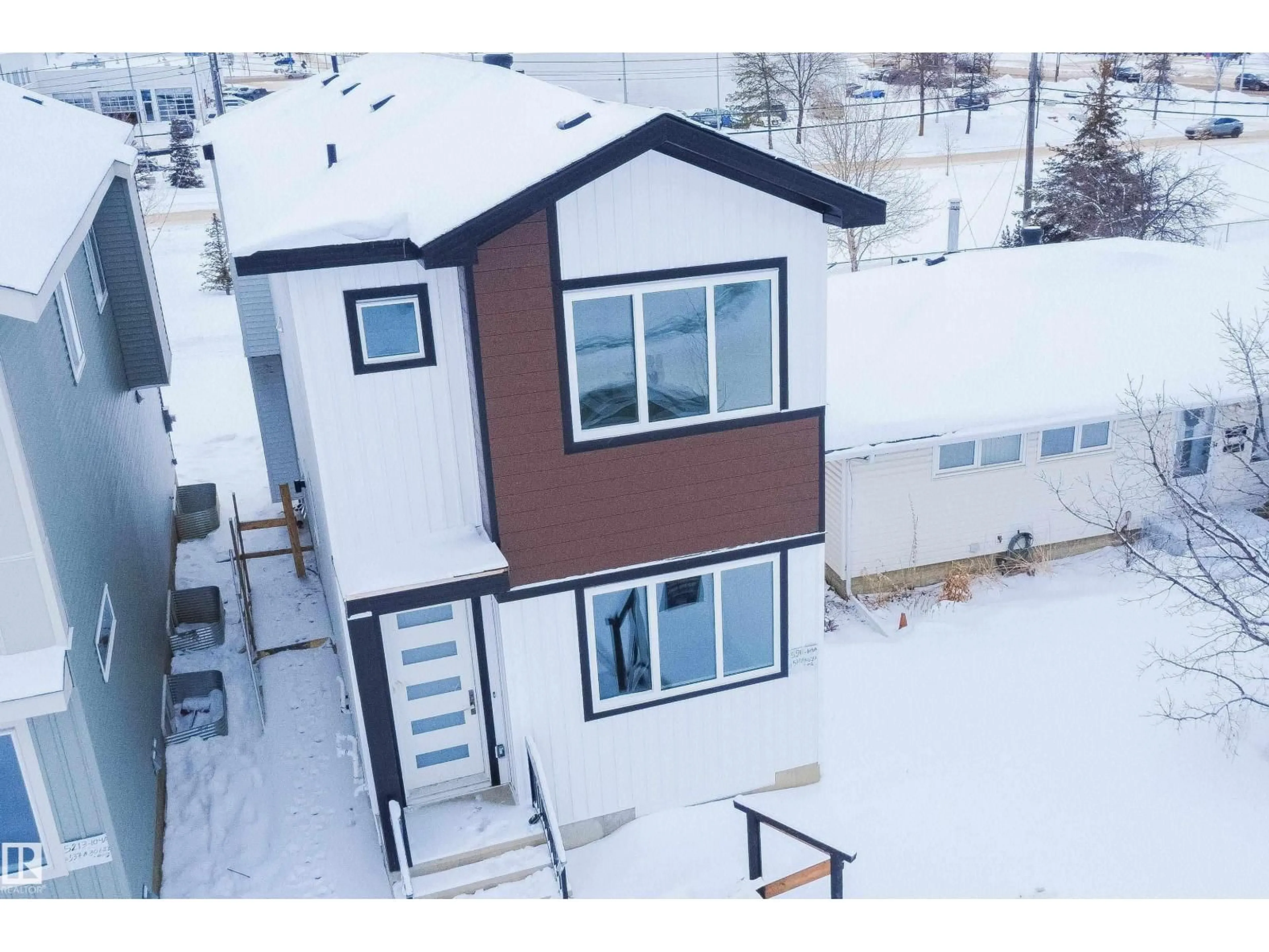 A pic from outside/outdoor area/front of a property/back of a property/a pic from drone, unknown for 5211 104A ST NW, Edmonton Alberta T6H2L9