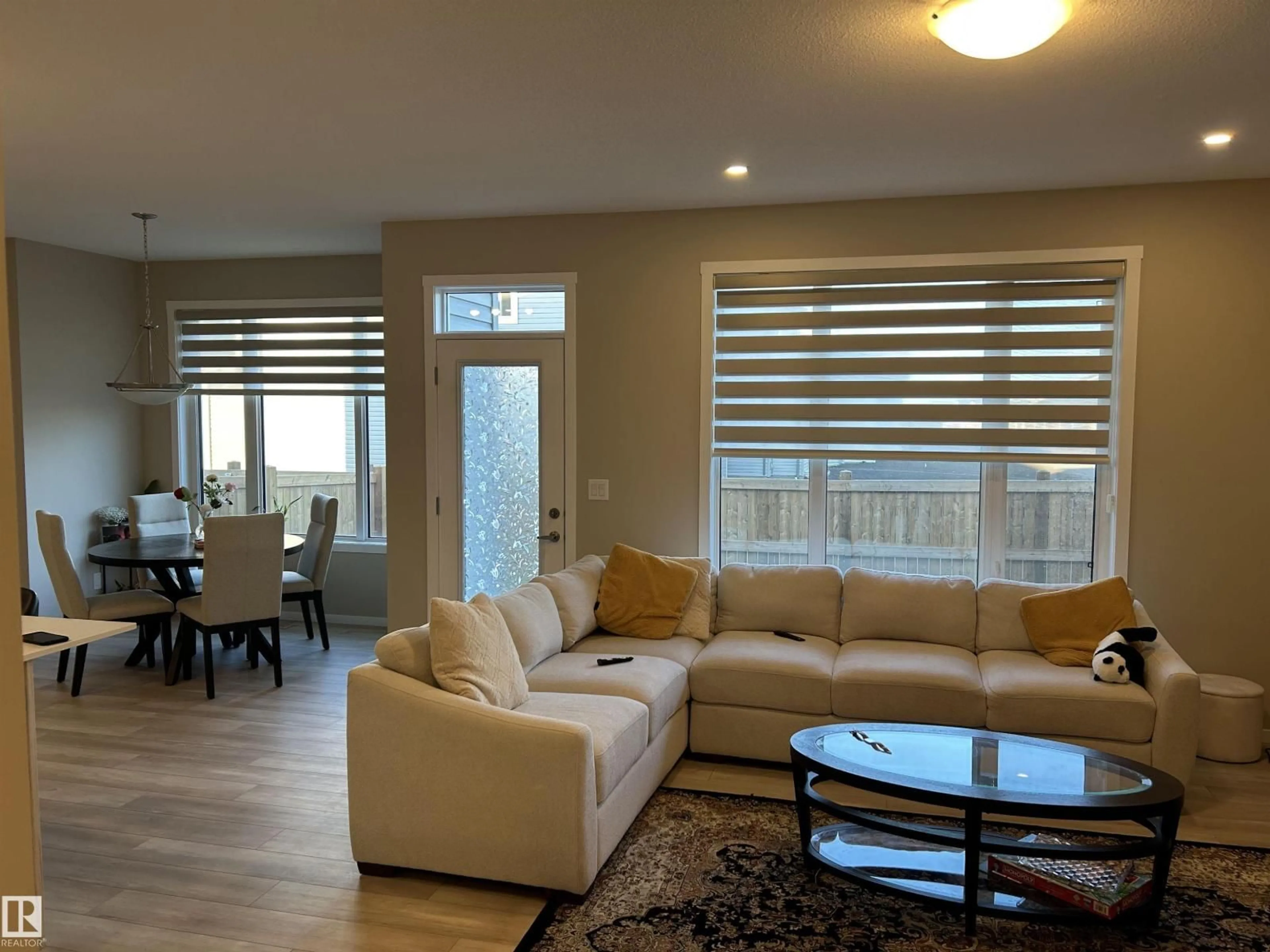 Living room with furniture, wood/laminate floor for 1019 OLD MAN CREEK BV, Sherwood Park Alberta T8H3A2