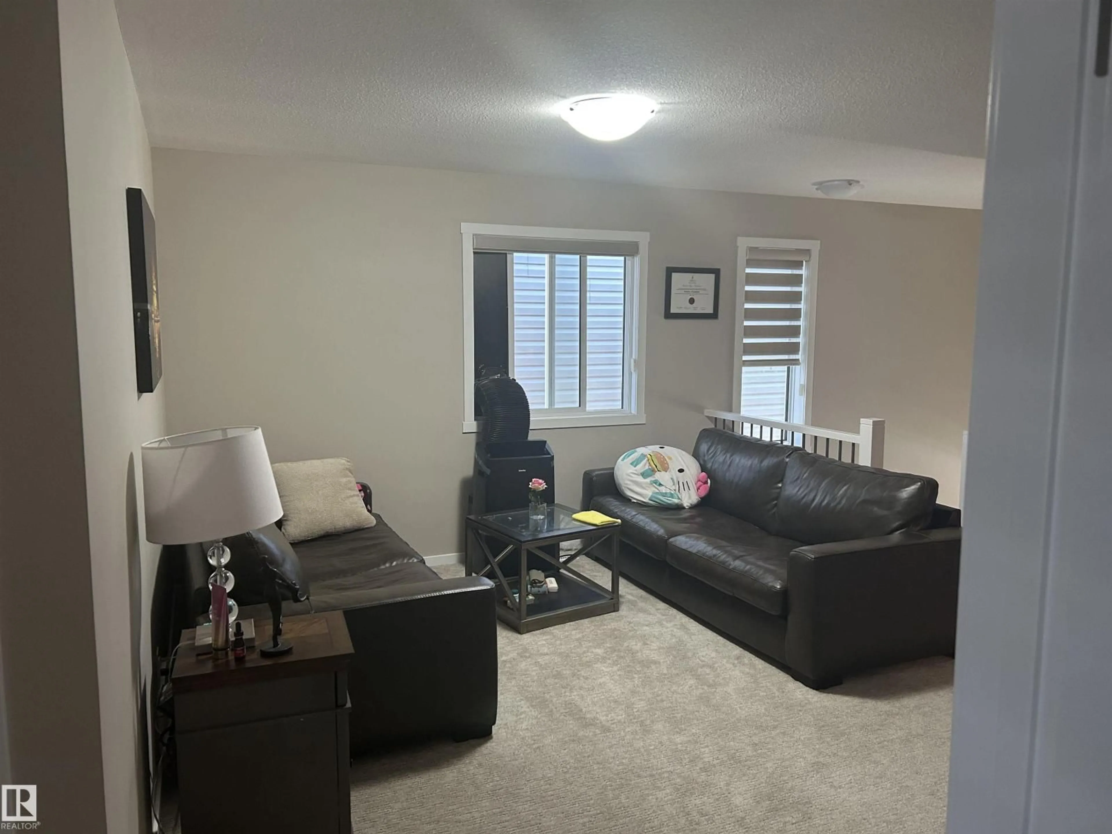 Living room with furniture, unknown for 1019 OLD MAN CREEK BV, Sherwood Park Alberta T8H3A2