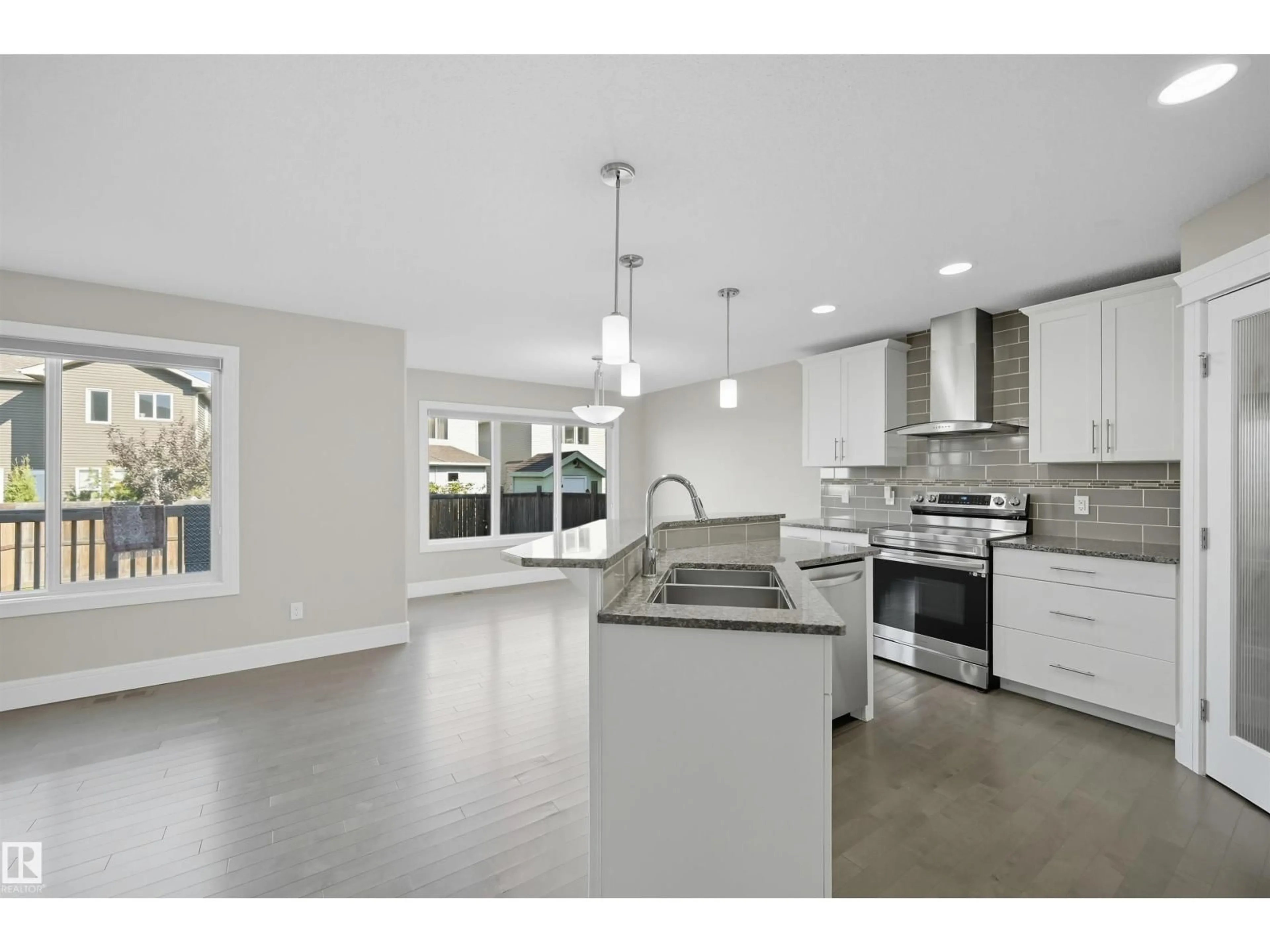 Open concept kitchen, ceramic/tile floor for SW - 7122 ARMOUR LINK LI, Edmonton Alberta T6W2P1