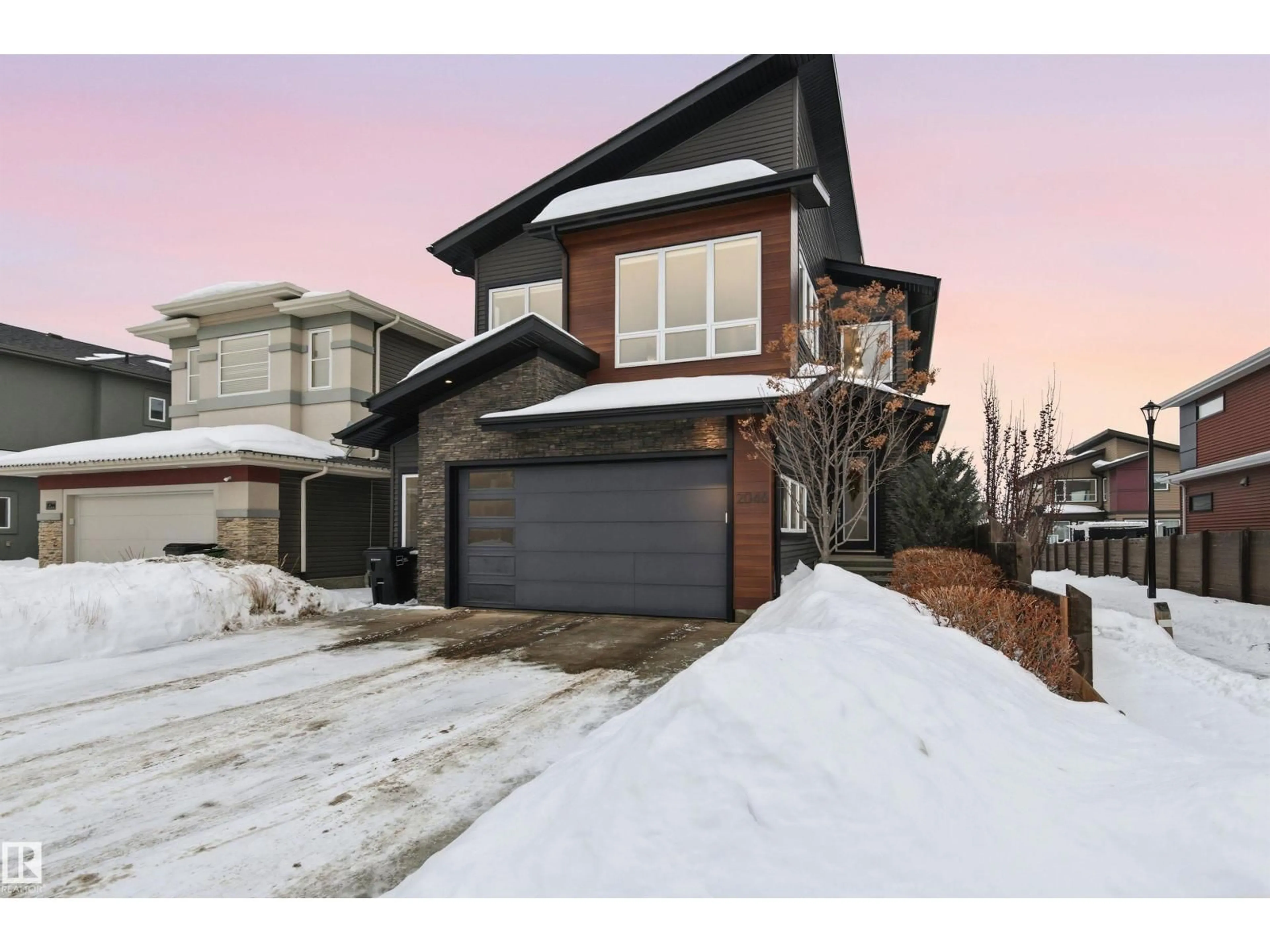 Home with brick exterior material, street for 2046 WARE RD, Edmonton Alberta T6W2W4