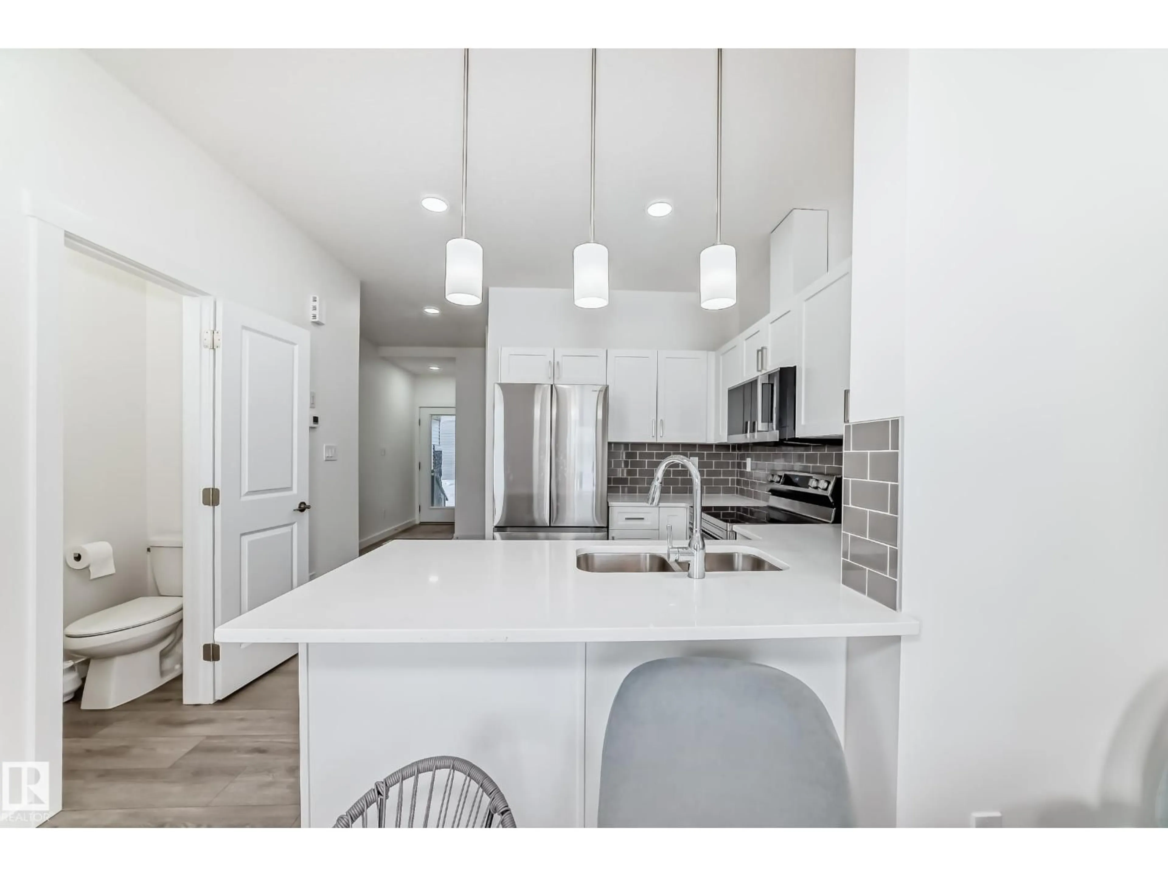 Open concept kitchen, ceramic/tile floor for #4 - 2710 66 ST, Edmonton Alberta T6X3H4
