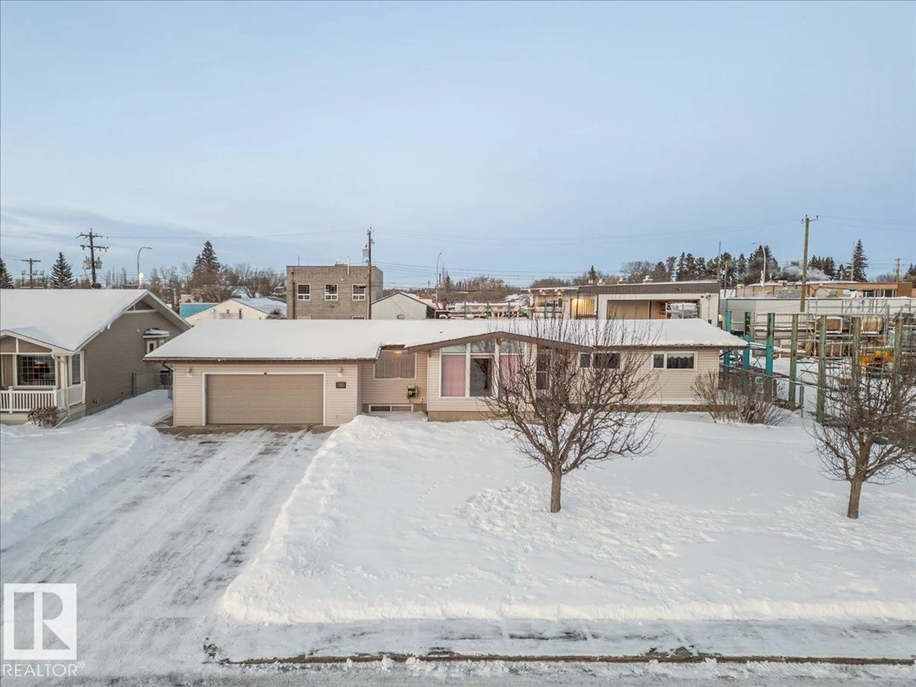 A pic from outside/outdoor area/front of a property/back of a property/a pic from drone, building for 4910 49 AV, Calmar Alberta T0C0V0