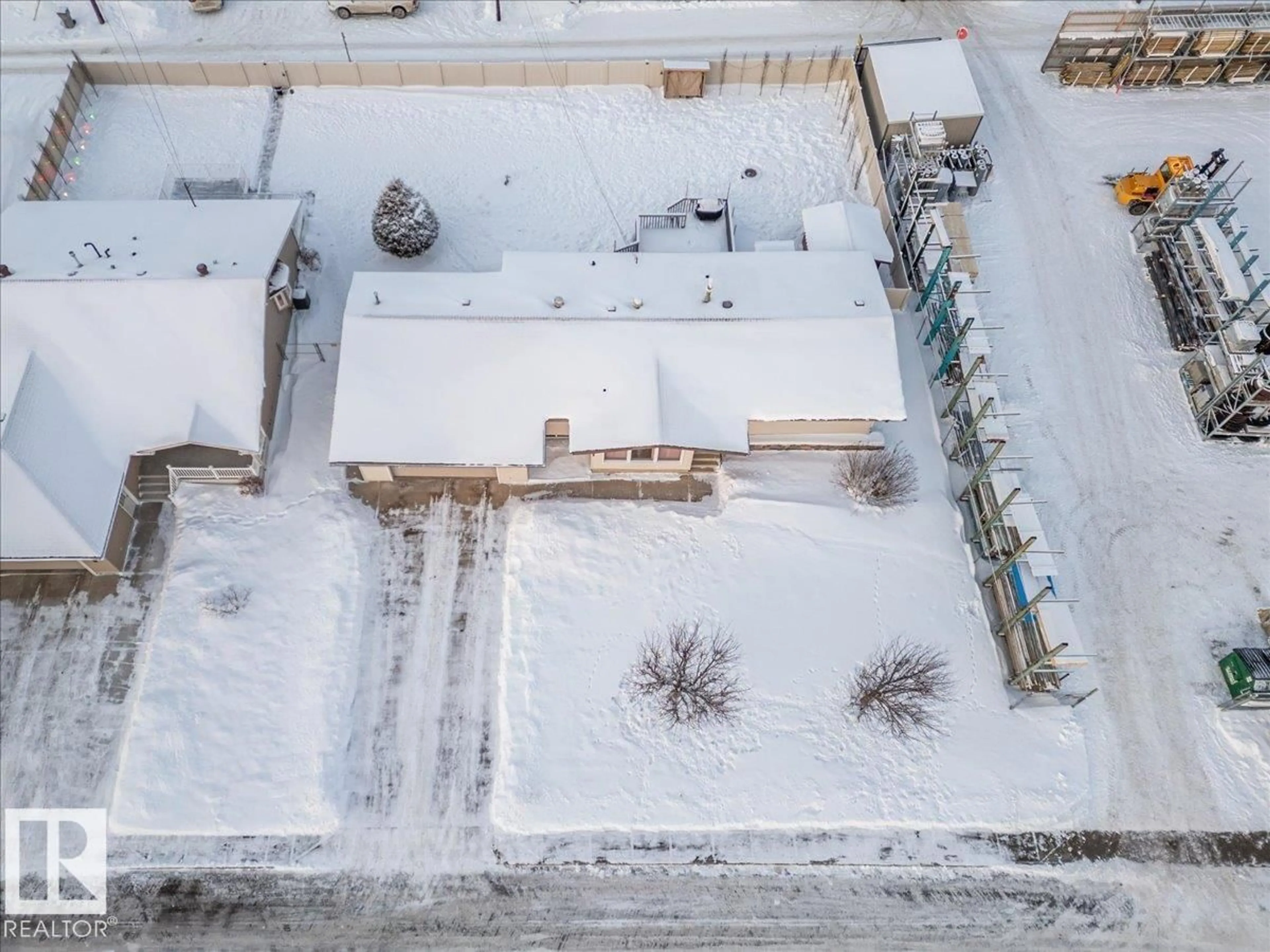 A pic from outside/outdoor area/front of a property/back of a property/a pic from drone, building for 4910 49 AV, Calmar Alberta T0C0V0