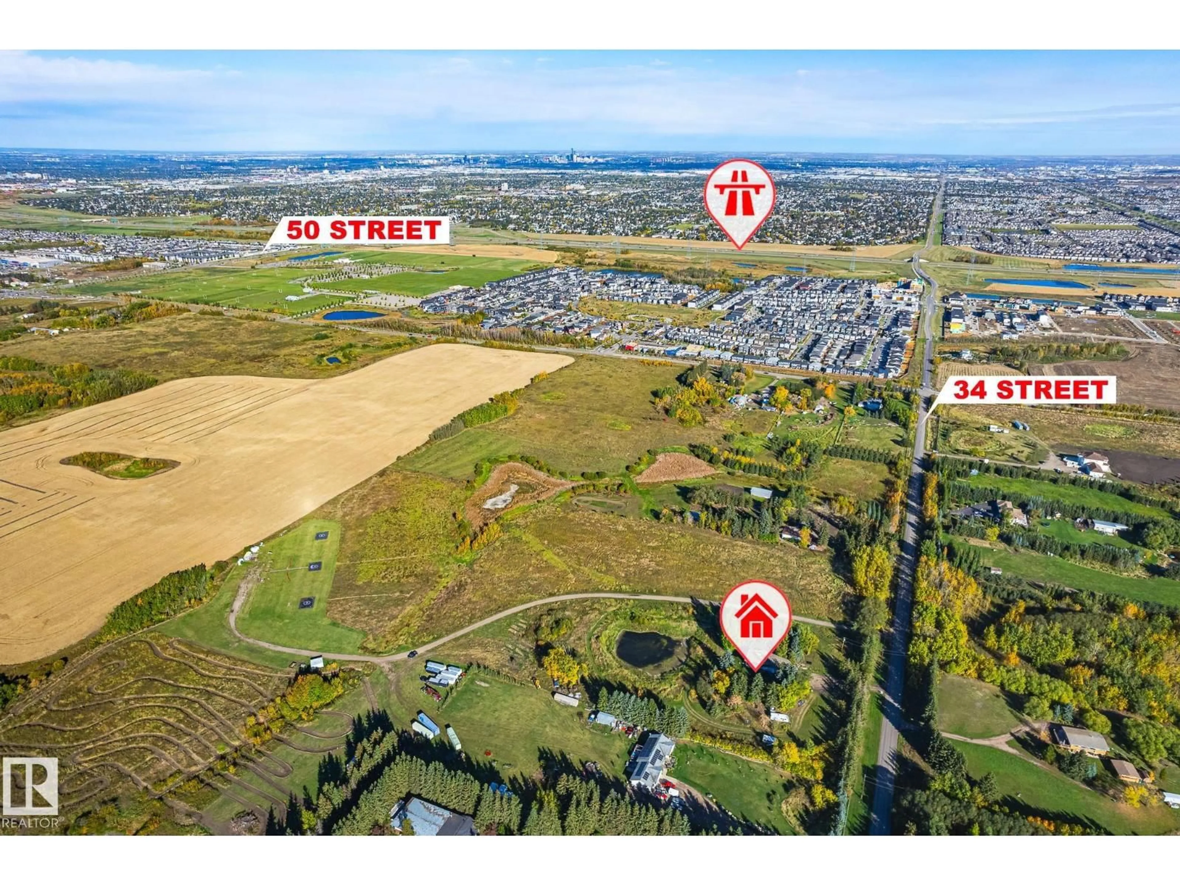 A pic from outside/outdoor area/front of a property/back of a property/a pic from drone, street for SW - 1450 34 ST, Edmonton Alberta T6X1A5