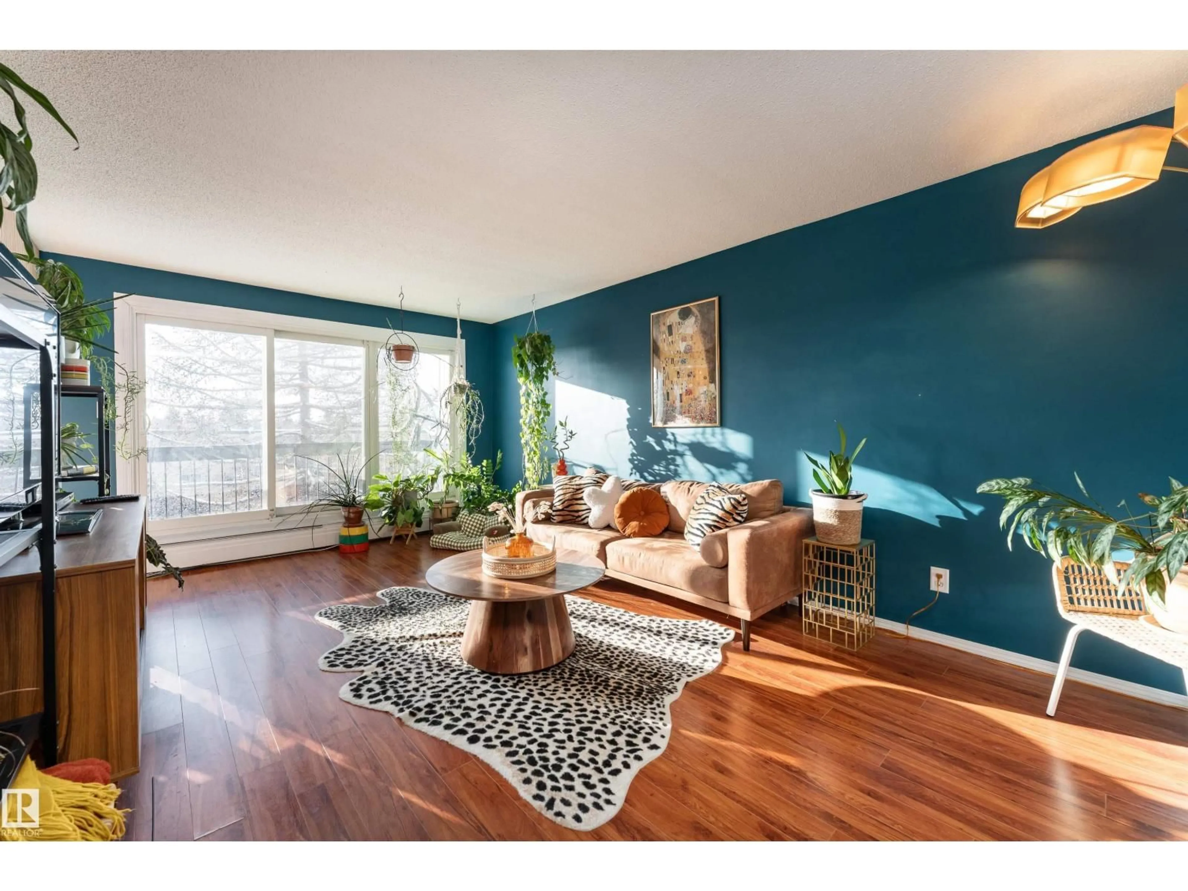 Living room with furniture, wood/laminate floor for #302 - 11435 41 AV, Edmonton Alberta T6J0T9