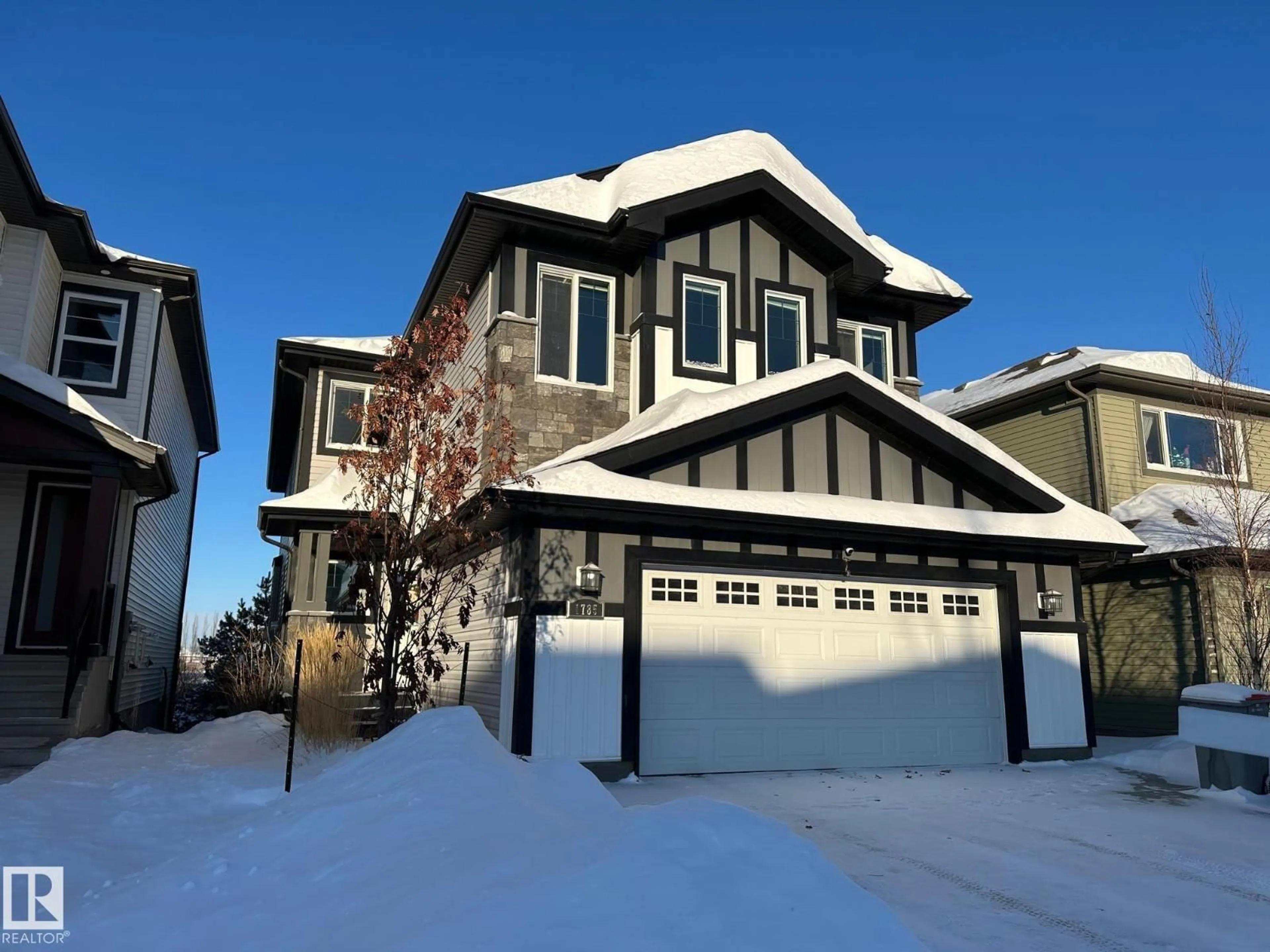 Home with vinyl exterior material, street for 1785 WESTERRA LO, Stony Plain Alberta T7Z0L8