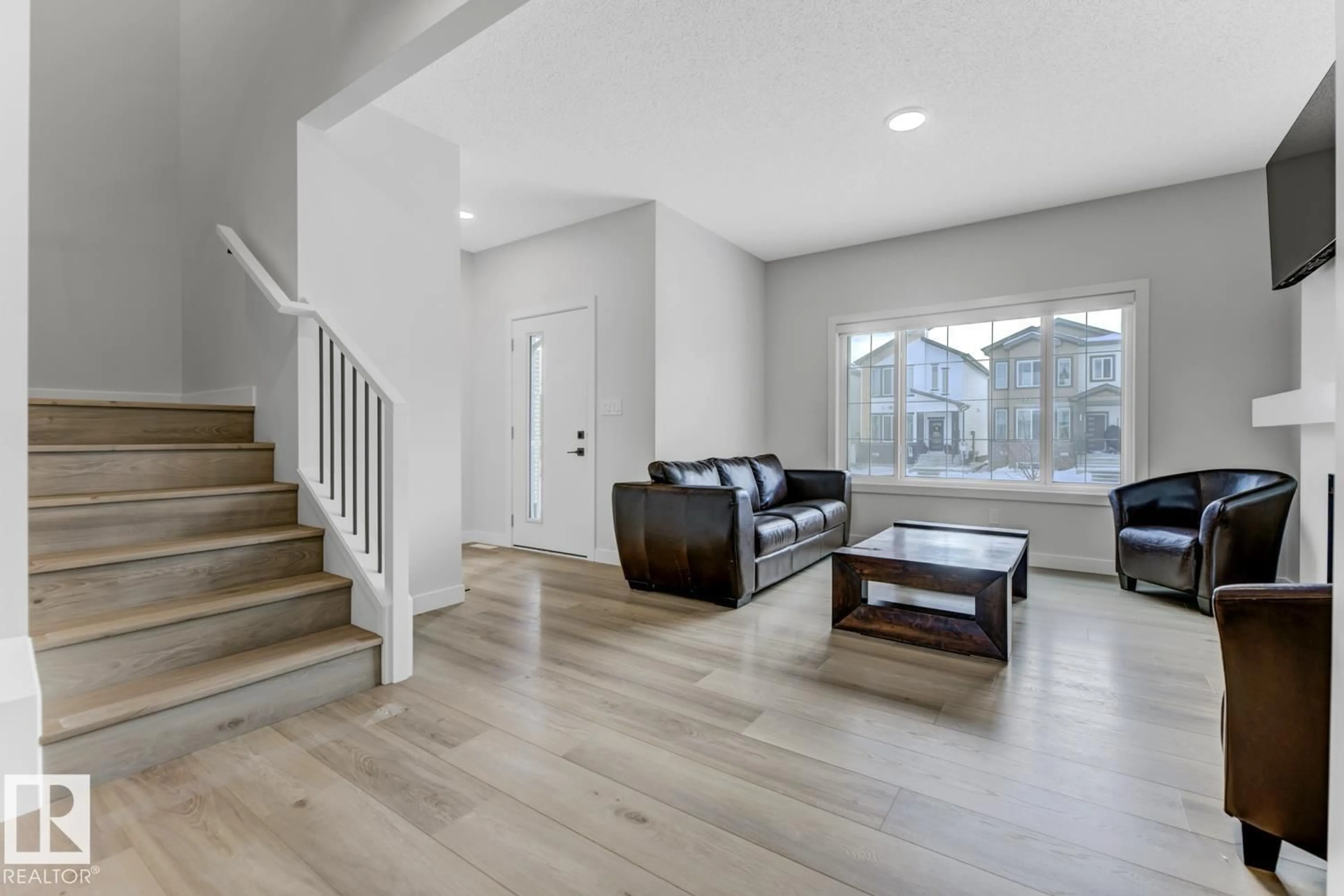 Living room with furniture, unknown for 6636 46 AV, Beaumont Alberta T4X2Z4