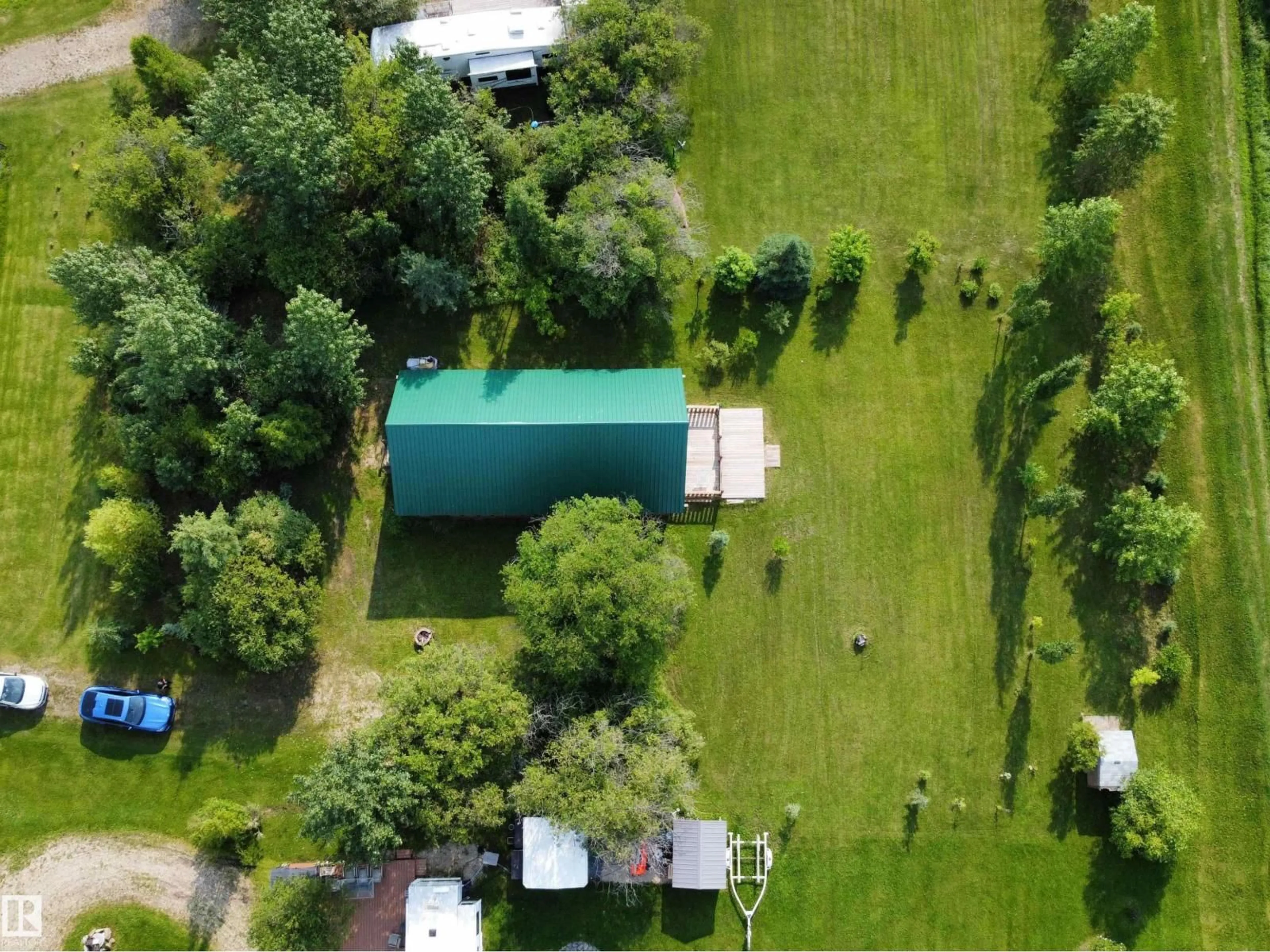 A pic from outside/outdoor area/front of a property/back of a property/a pic from drone, unknown for 260 465015 RANGE ROAD 63A, Rural Wetaskiwin County Alberta T0C0T0