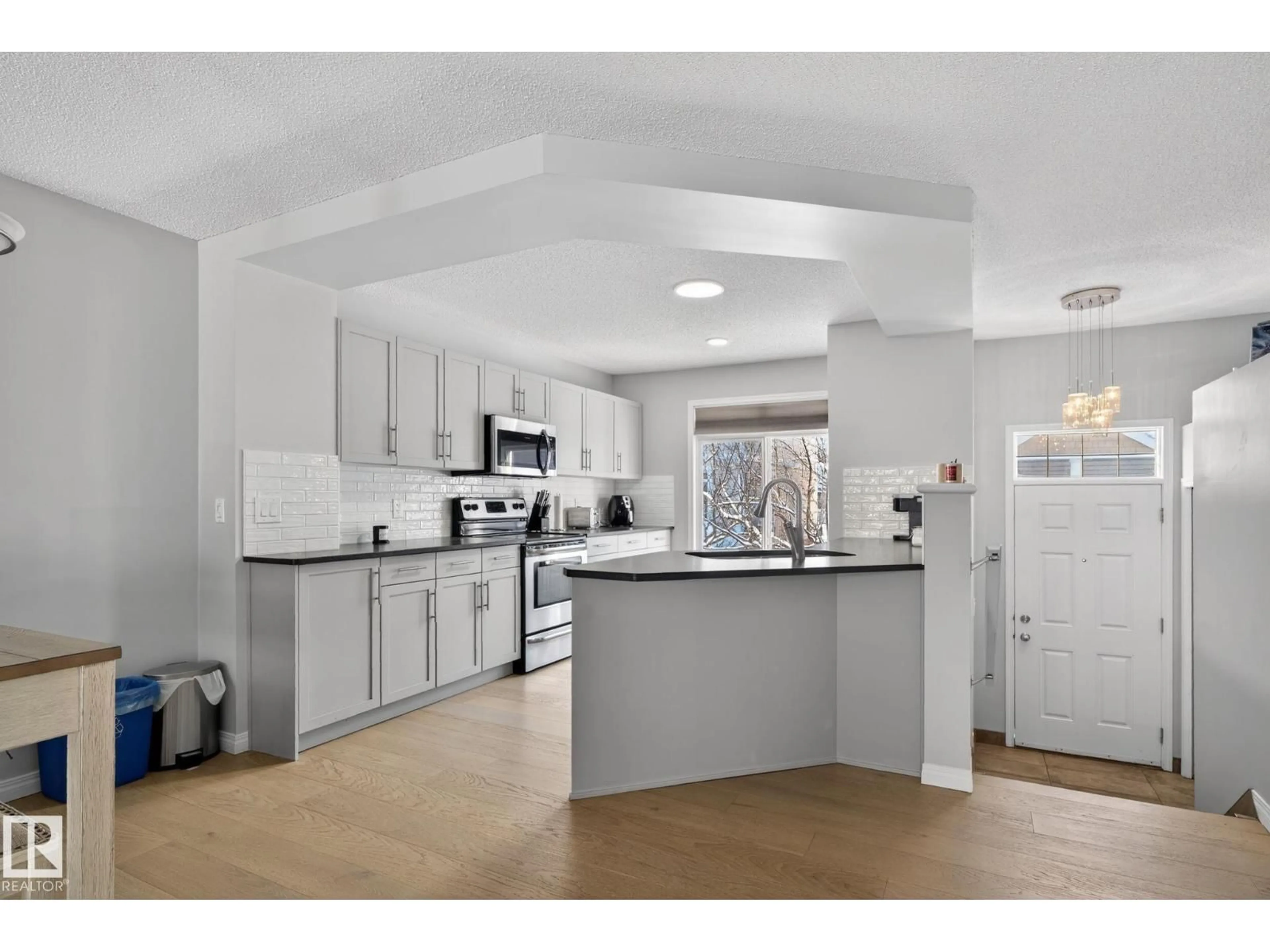 Open concept kitchen, ceramic/tile floor for 60 - 1804 70 ST, Edmonton Alberta T6X0H4