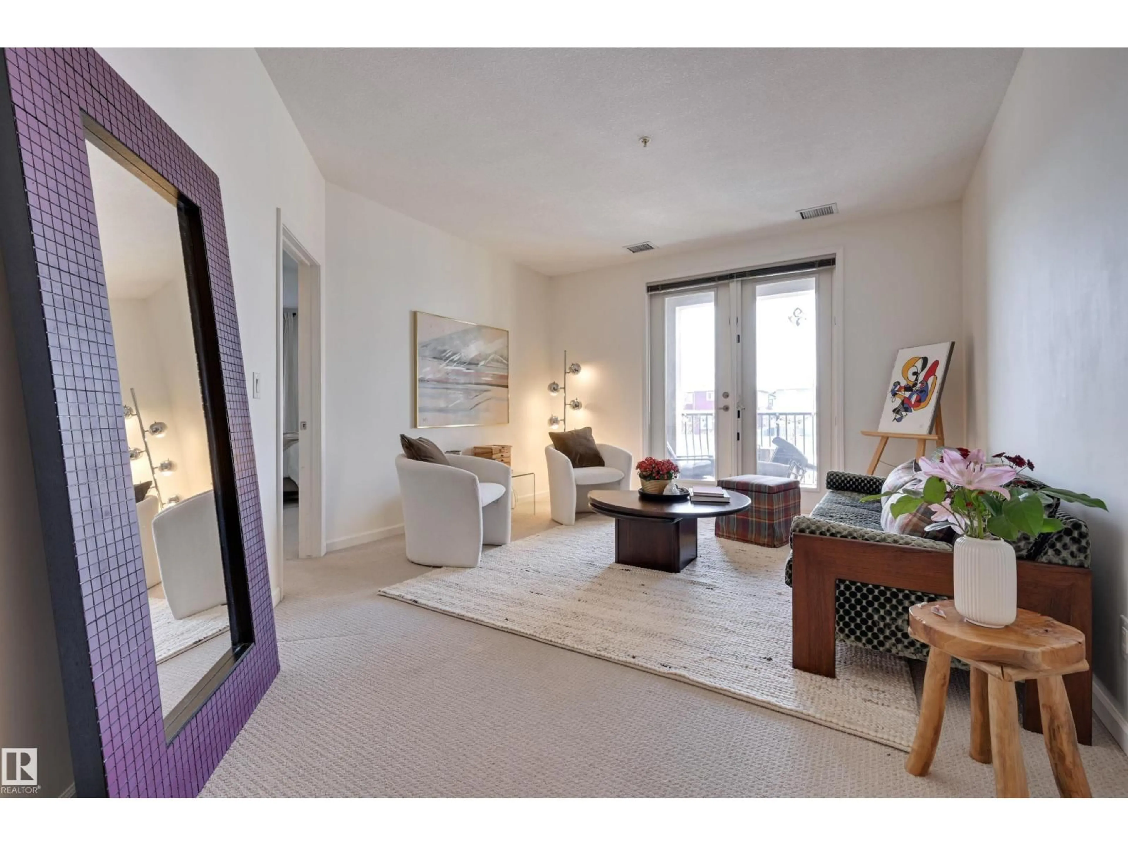 Living room with furniture, unknown for 6083 - 221 MAYNARD WY, Edmonton Alberta T6R0S5