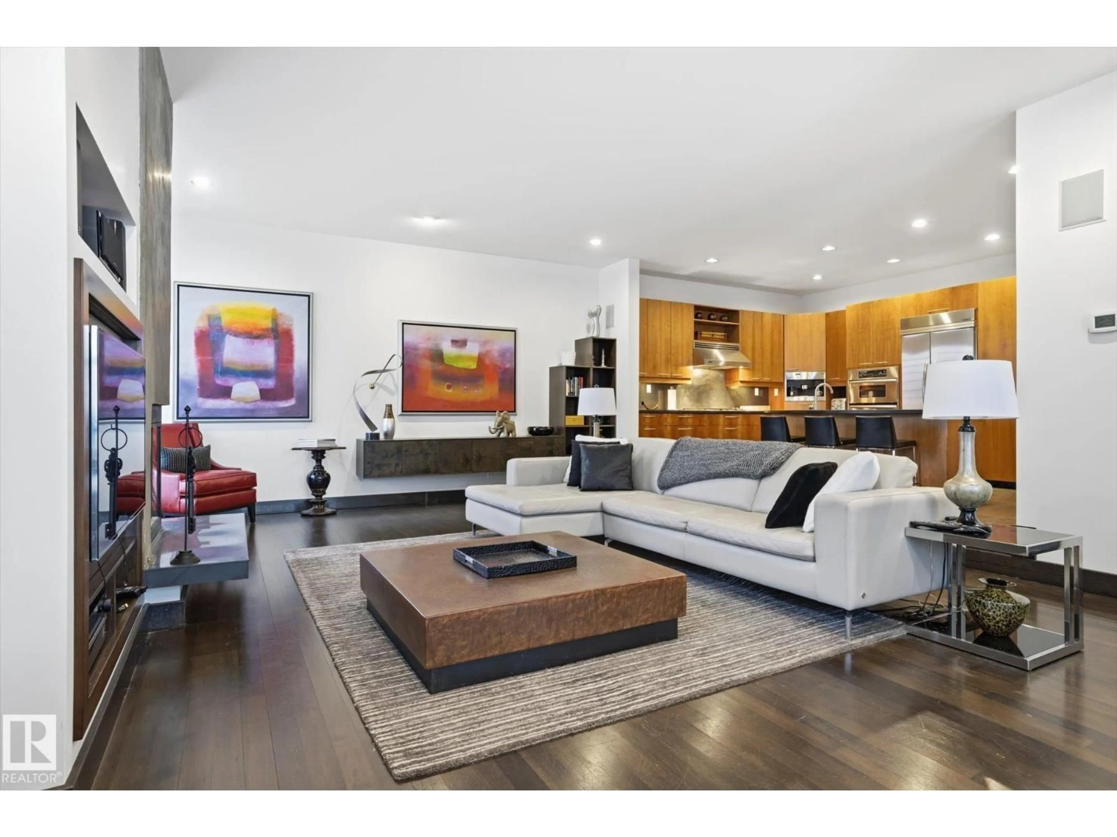 Living room with furniture, wood/laminate floor for NW - 9012 98 ST, Edmonton Alberta T6E3M5