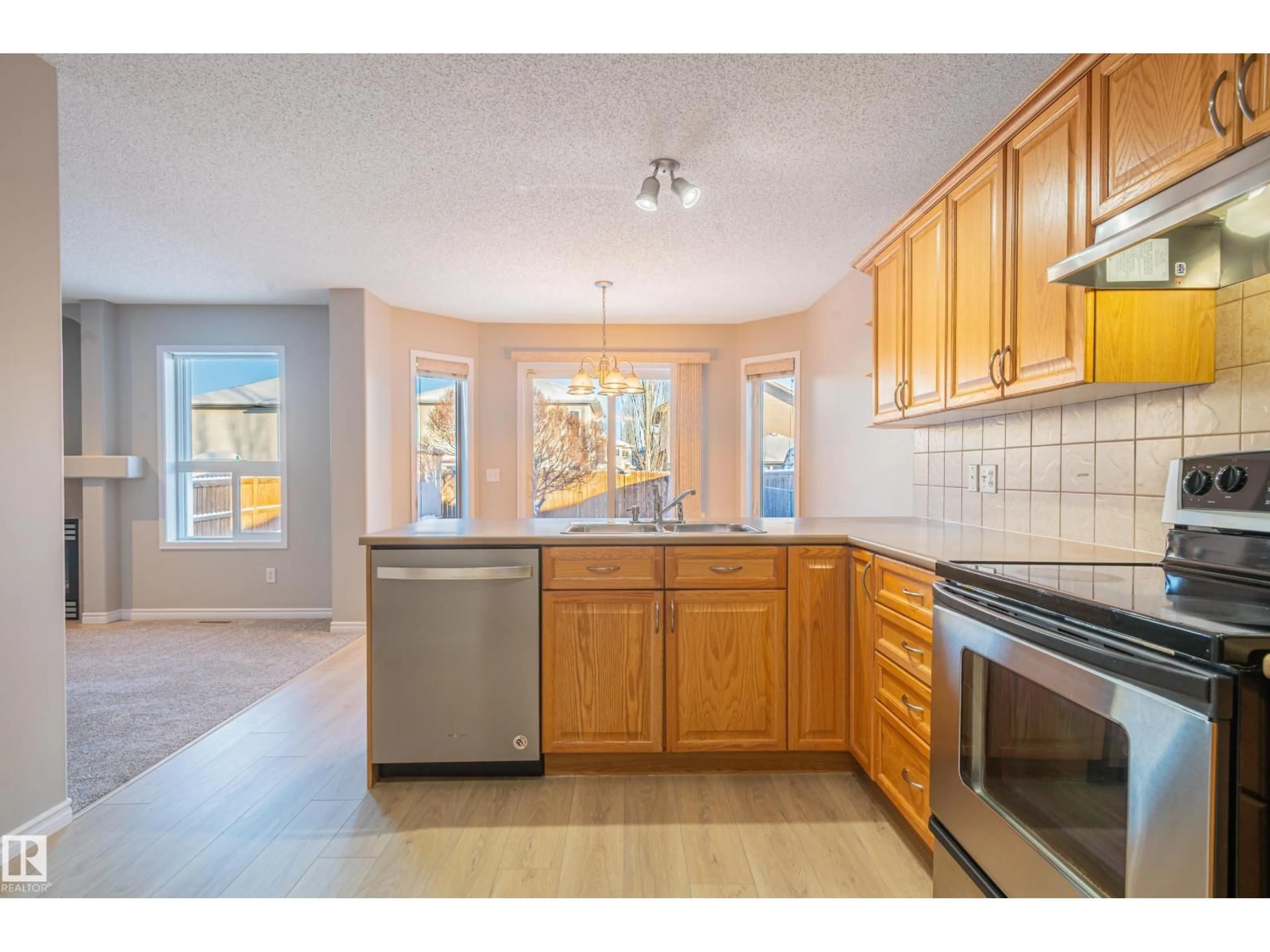 Open concept kitchen, unknown for 4 SPRUCE GROUSE CR, Spruce Grove Alberta T7X4M9