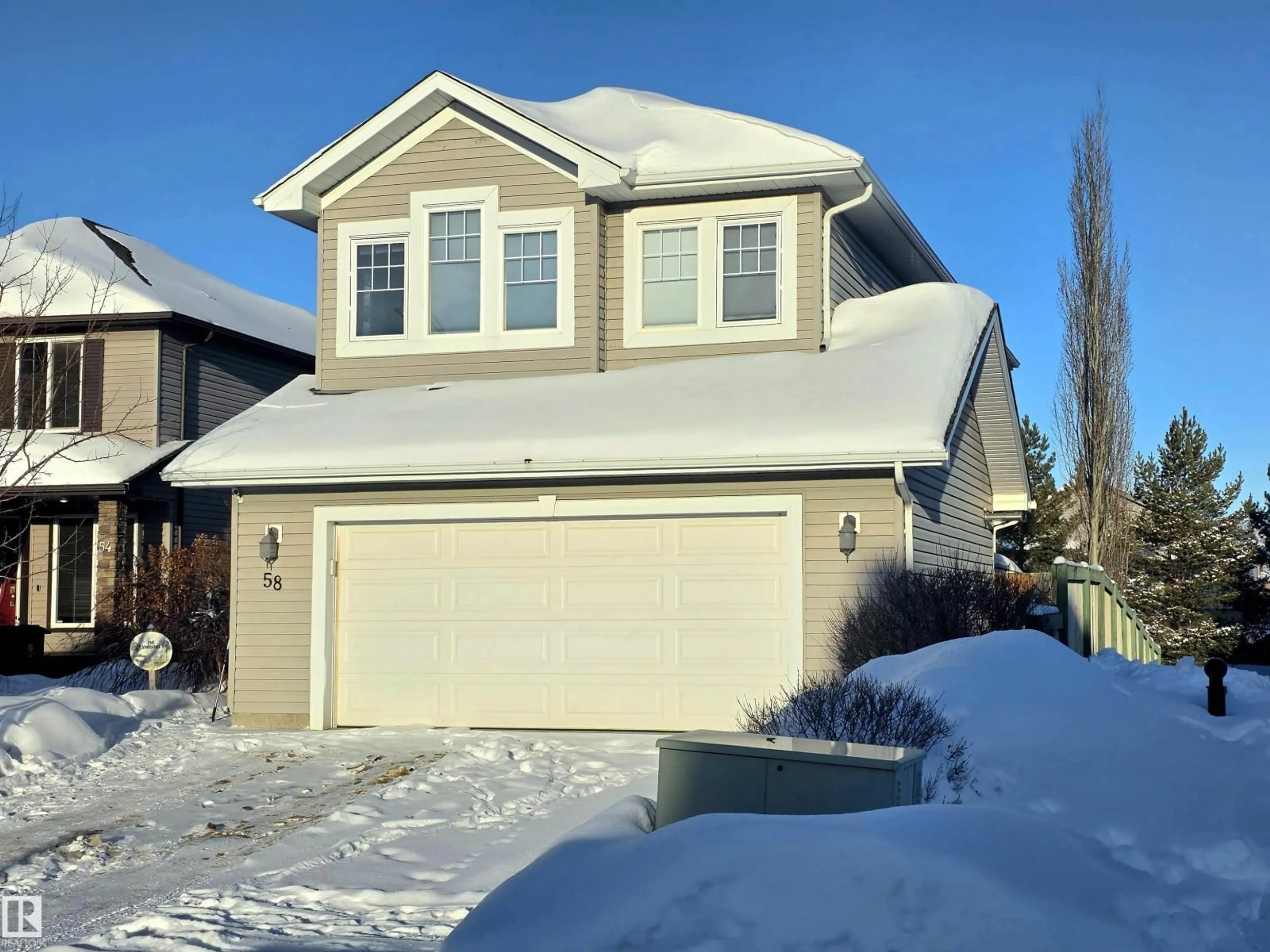 Home with vinyl exterior material, street for 58 CRANBERRY BN, Fort Saskatchewan Alberta T8L0H2