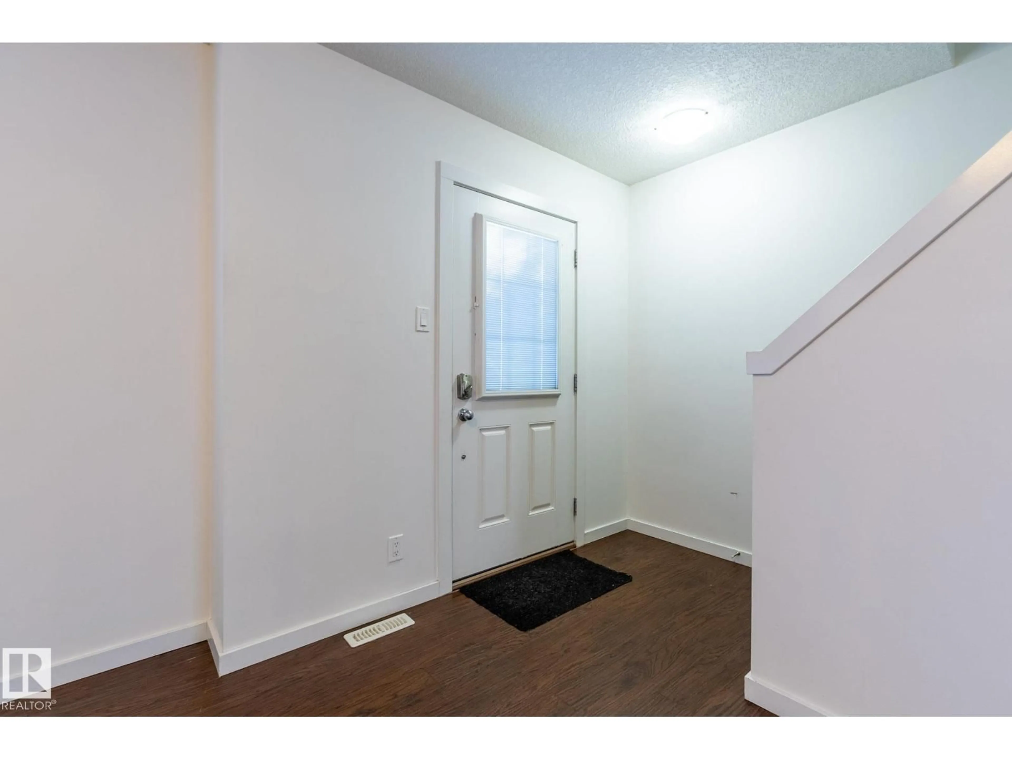 Indoor entryway for 14 - 9515 160 AV, Edmonton Alberta T5X0C7