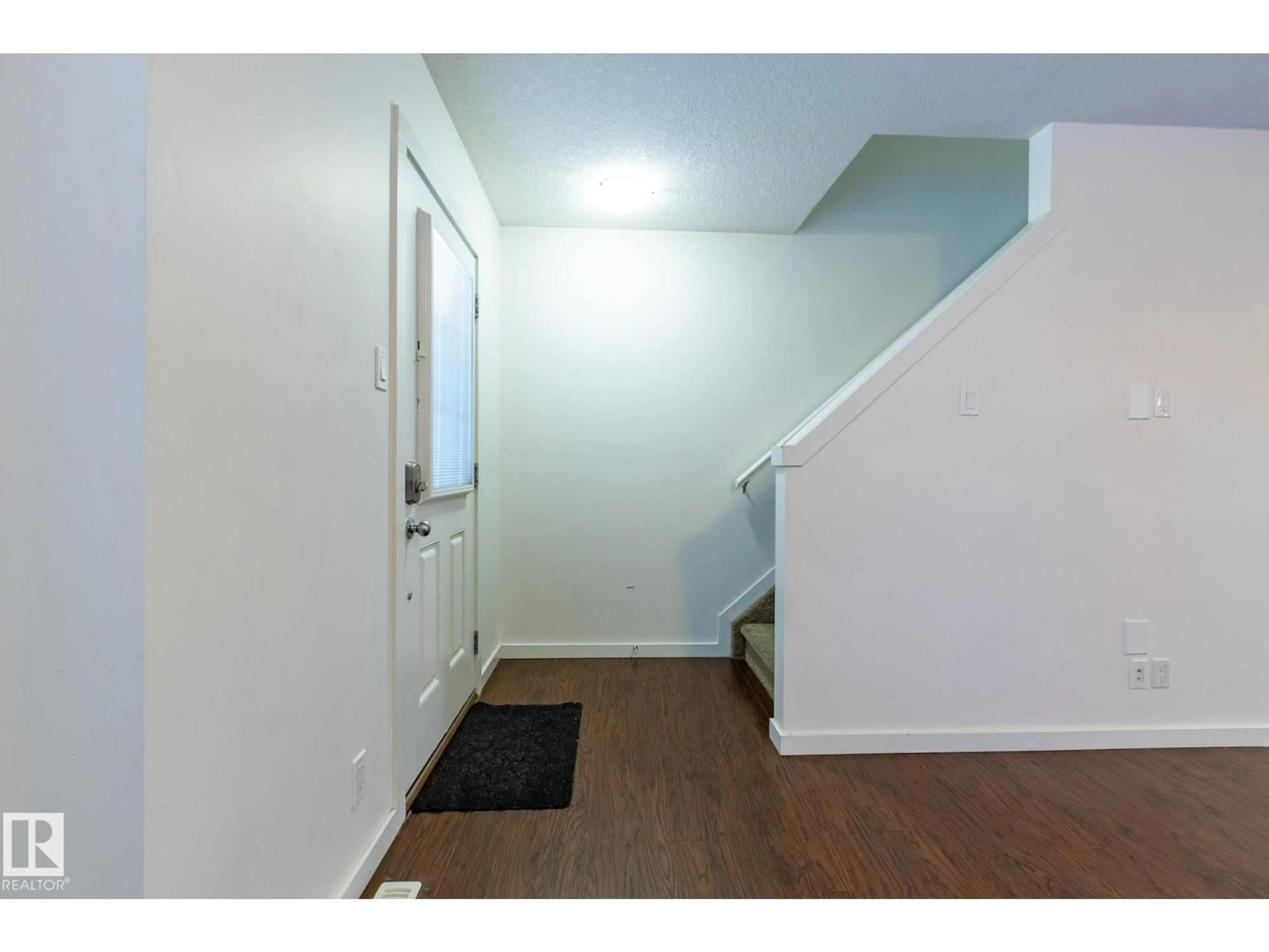 Indoor entryway for 14 - 9515 160 AV, Edmonton Alberta T5X0C7