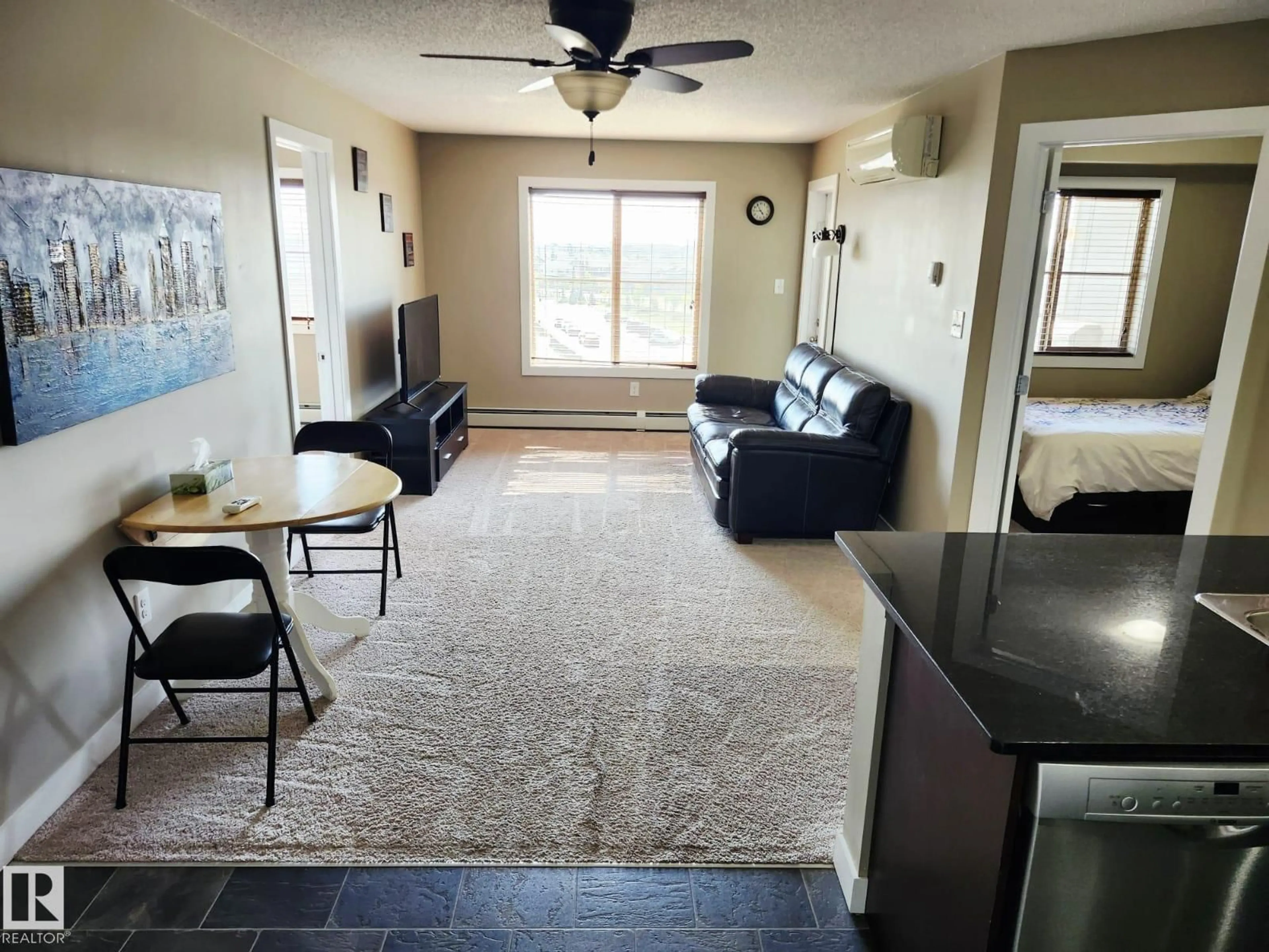 Living room with furniture, unknown for #407 - 270 MCCONACHIE DR, Edmonton Alberta T5Y3N4