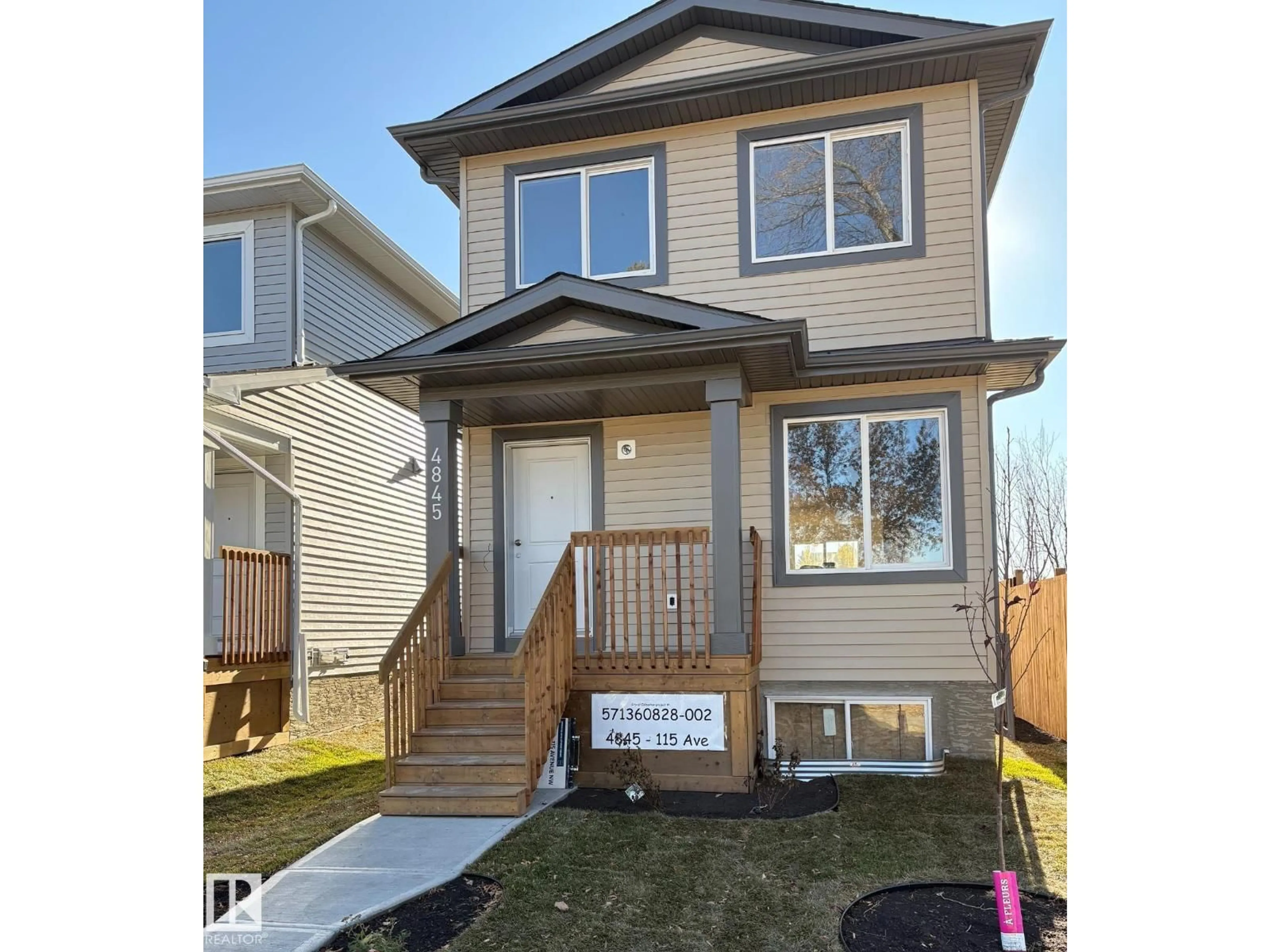 Home with vinyl exterior material, street for 4845 115 AV, Edmonton Alberta T5W0W3