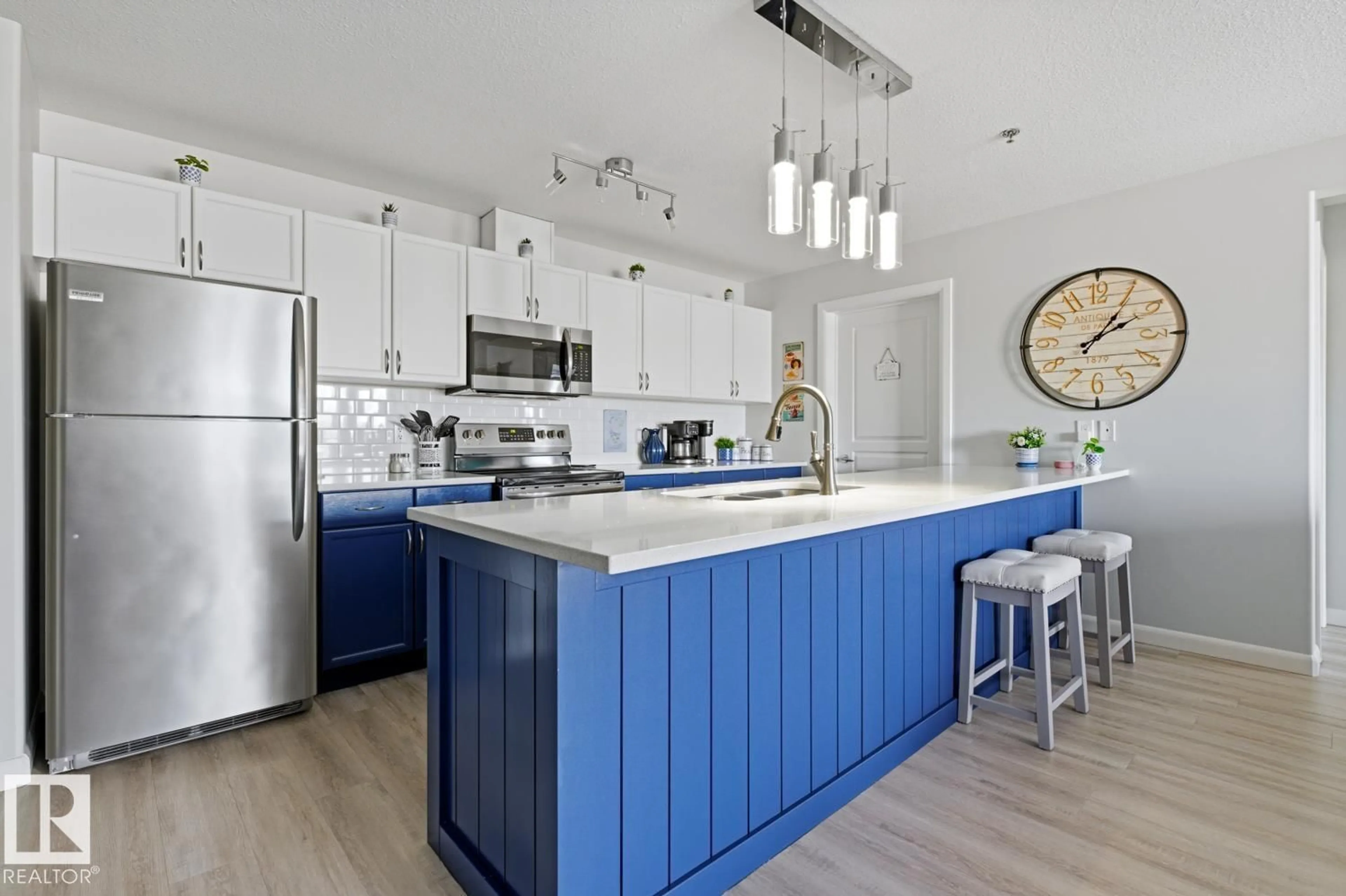 Open concept kitchen, unknown for #314 - 530 HOOKE RD, Edmonton Alberta T5A5J5