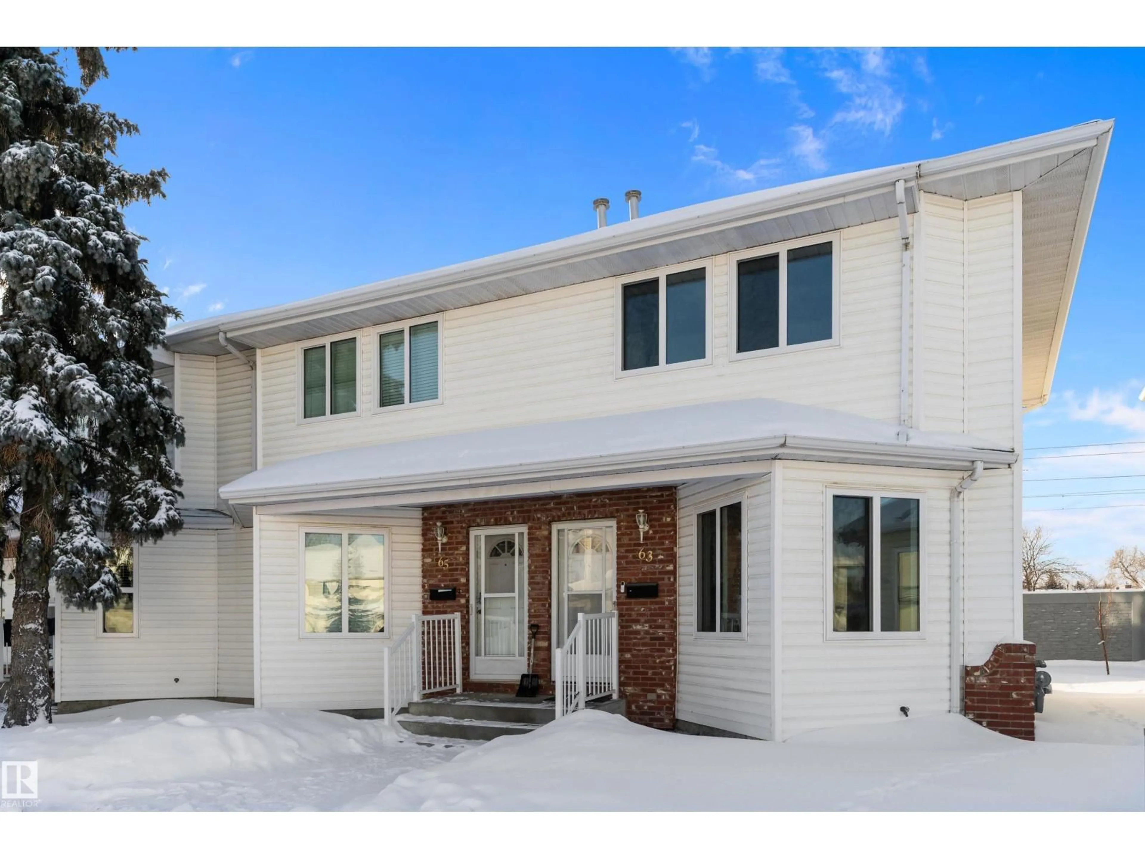 Home with brick exterior material, street for #63 - 1033 YOUVILLE DR, Edmonton Alberta T6L6V9