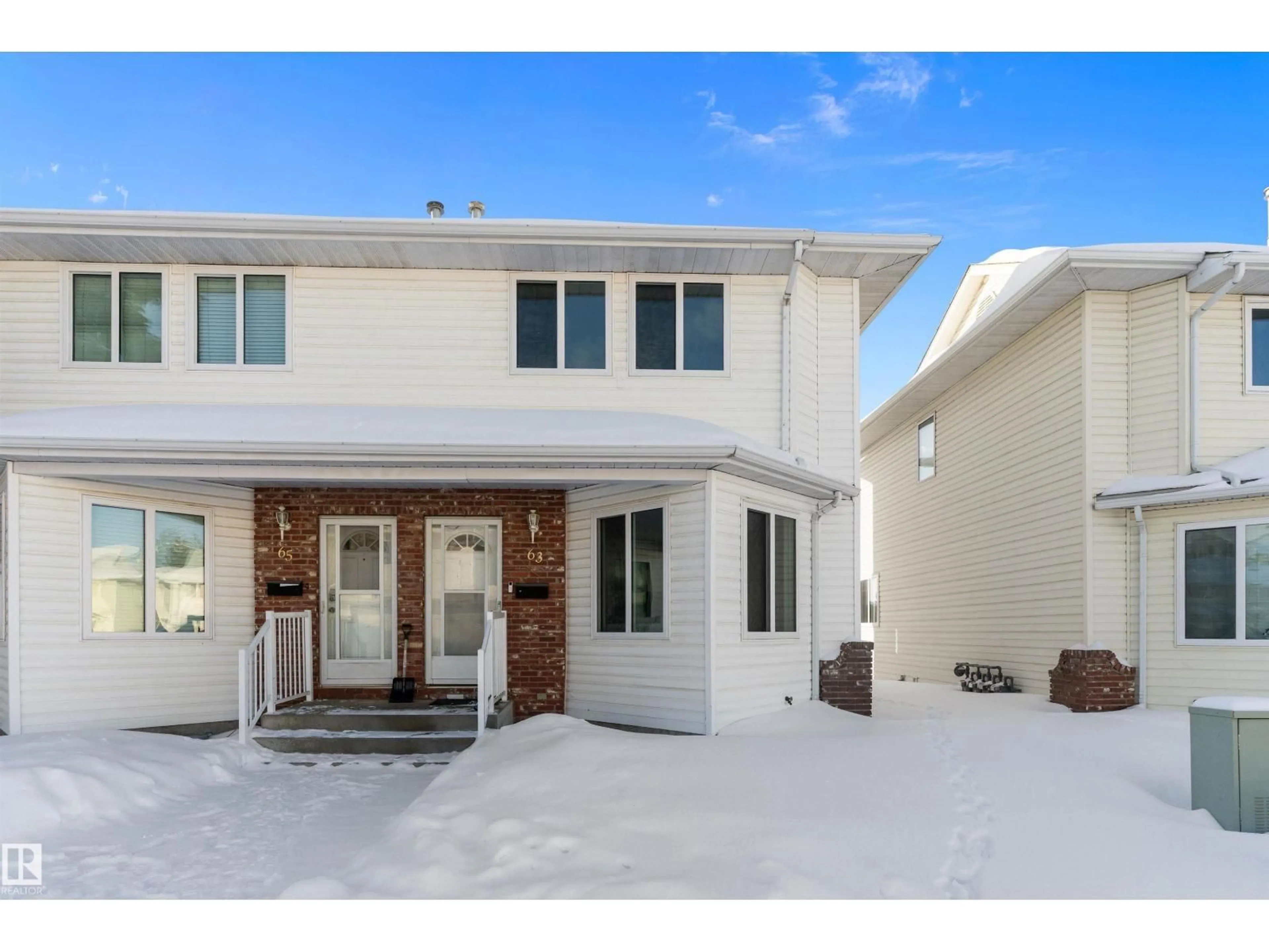 Home with vinyl exterior material, street for #63 - 1033 YOUVILLE DR, Edmonton Alberta T6L6V9