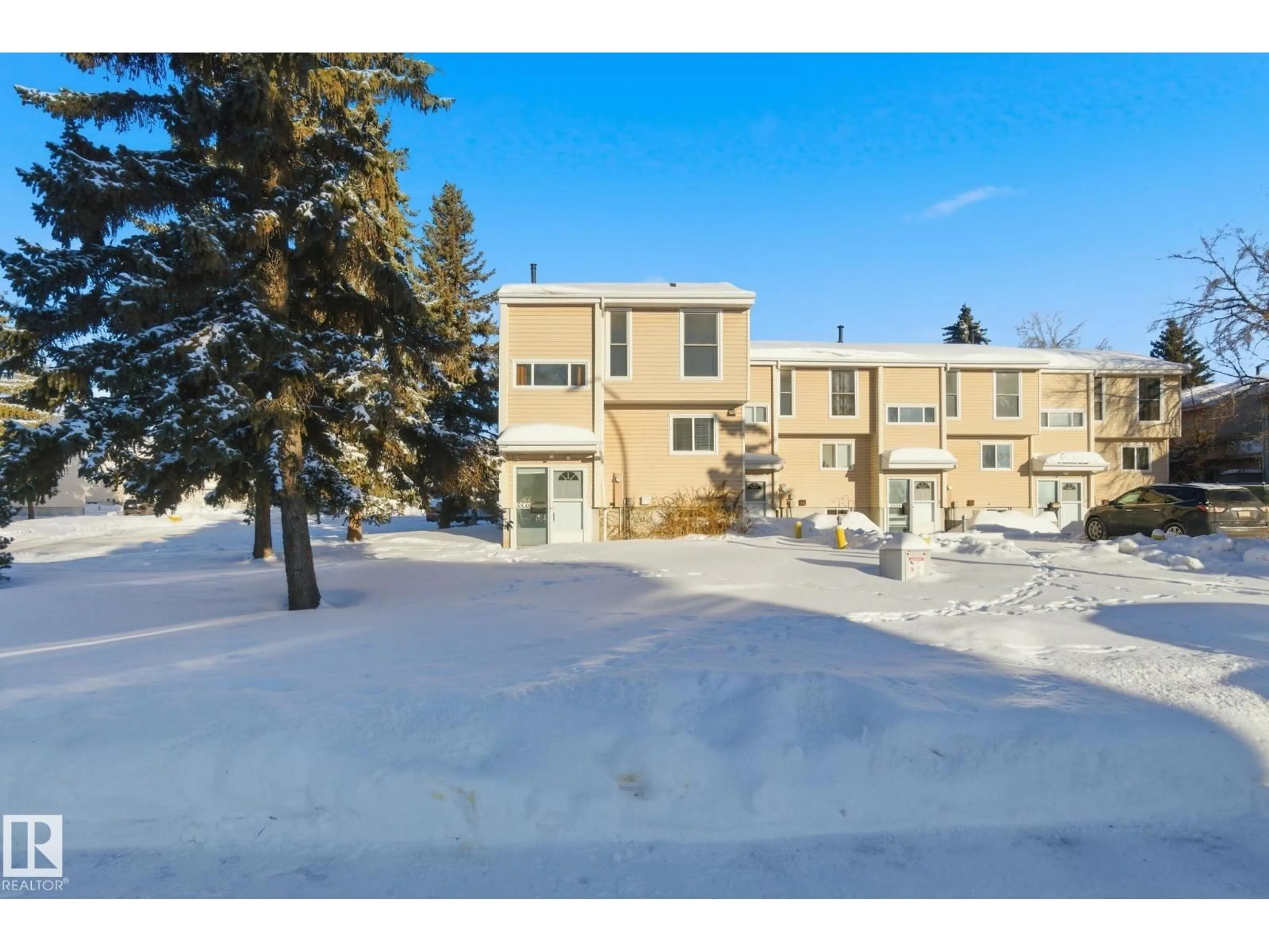 A pic from outside/outdoor area/front of a property/back of a property/a pic from drone, unknown for NW - 5538 145 AV, Edmonton Alberta T5A3R3