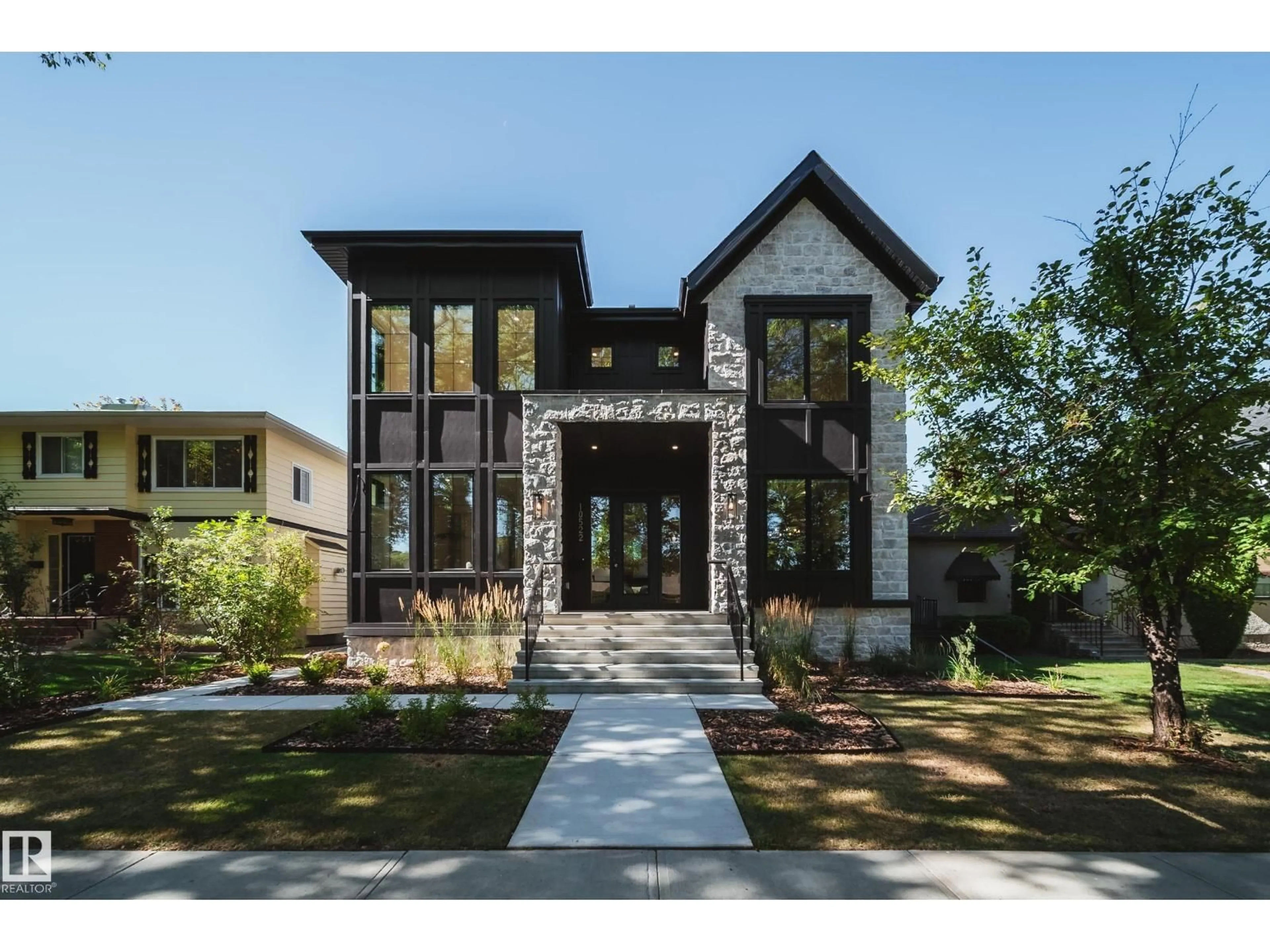 Home with brick exterior material, street for 10522 134 ST NW, Edmonton Alberta T5N2B5