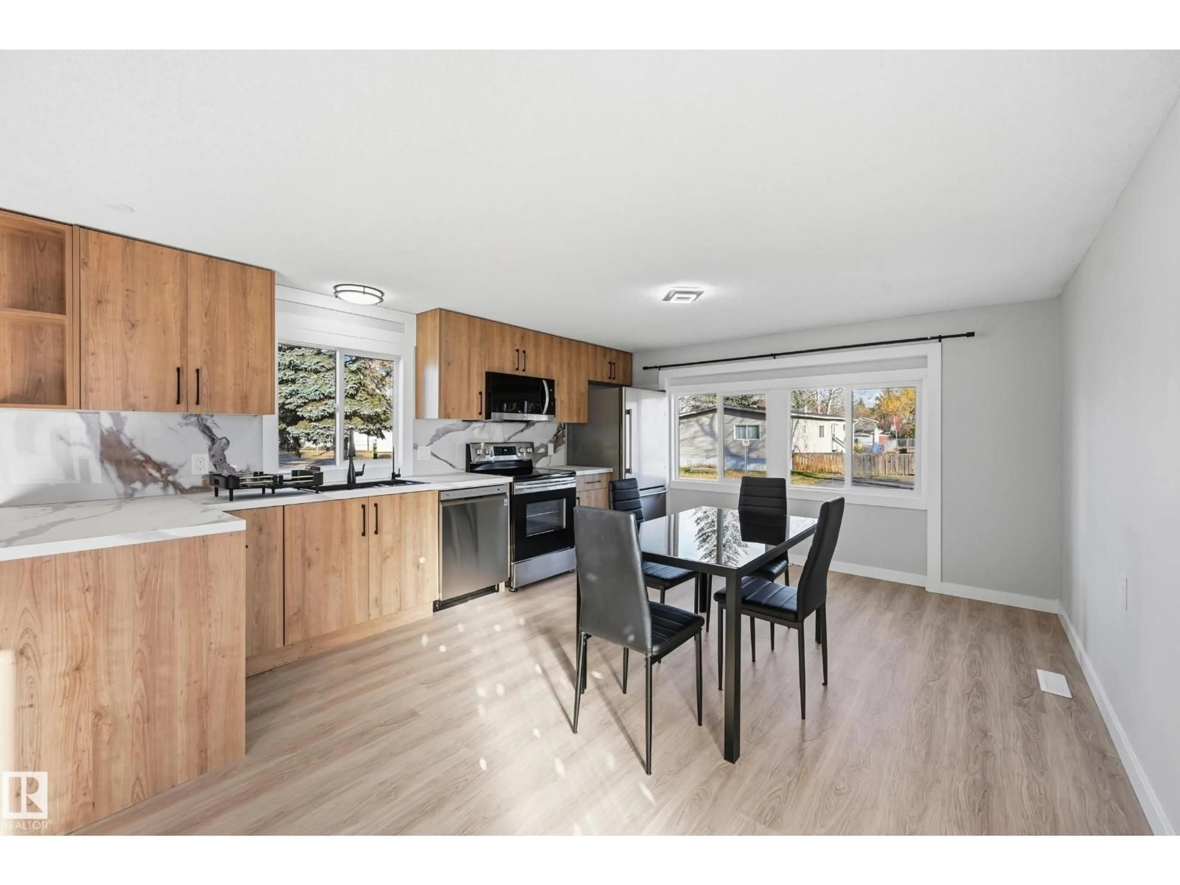 Open concept kitchen, wood/laminate floor for 2 CLIFF CR, Edmonton Alberta T6P1B6
