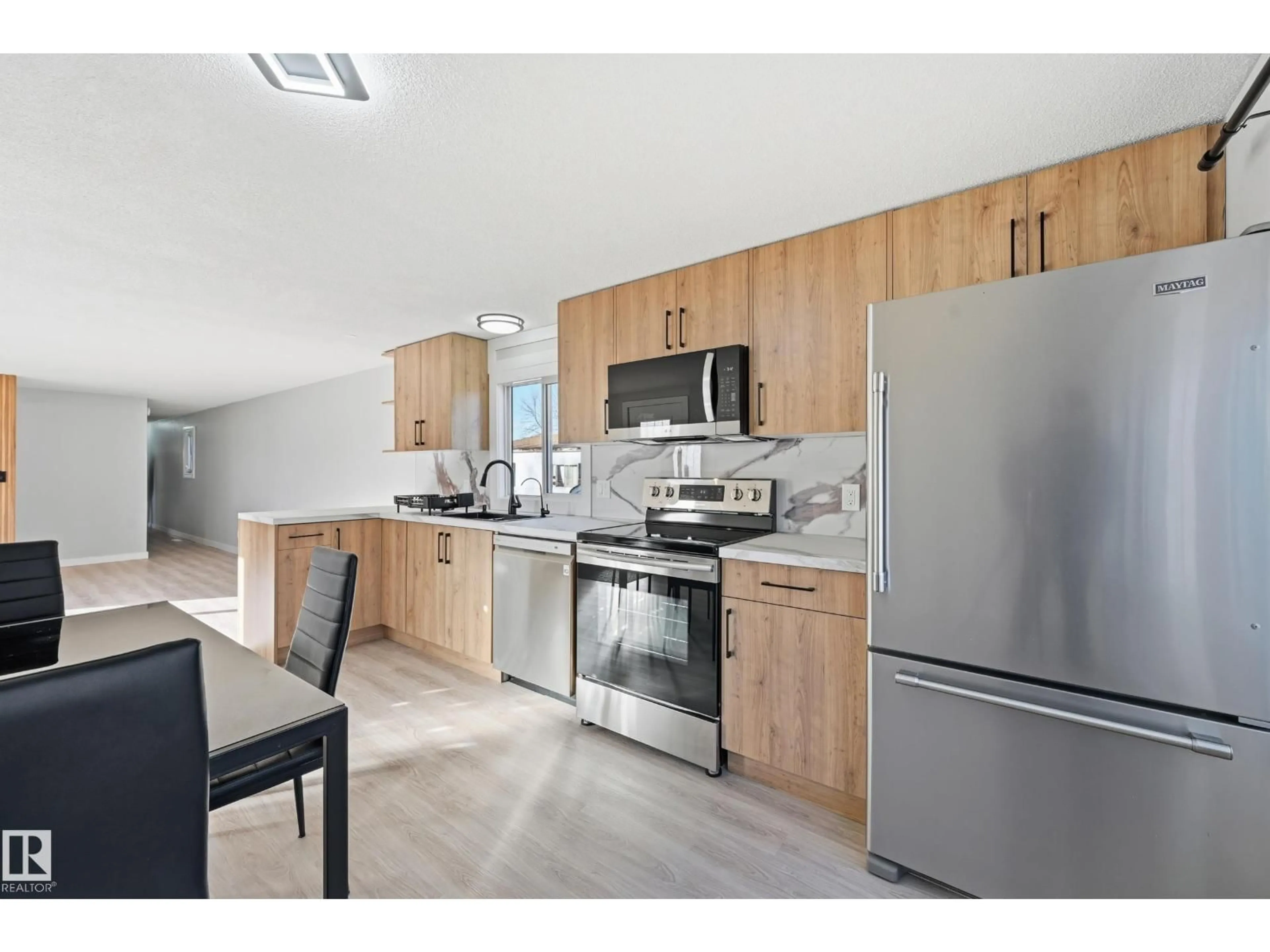 Open concept kitchen, unknown for 2 CLIFF CR, Edmonton Alberta T6P1B6